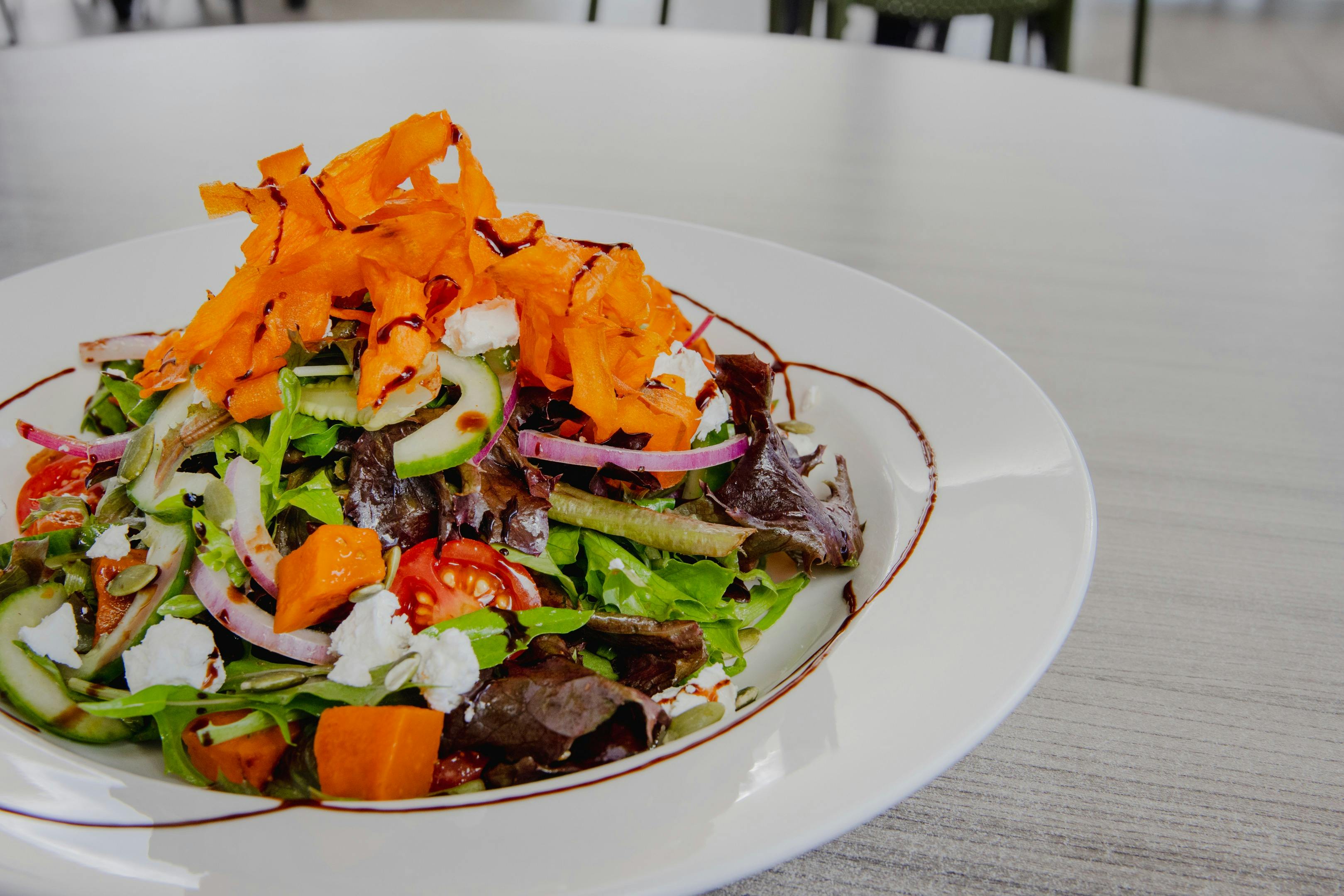 Plate of salad on a table at Orion Hotel Springfield