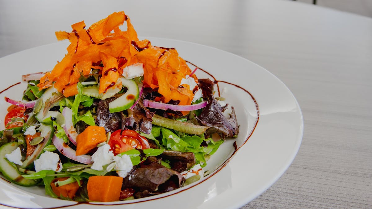 Plate of salad on a table at Orion Hotel Springfield