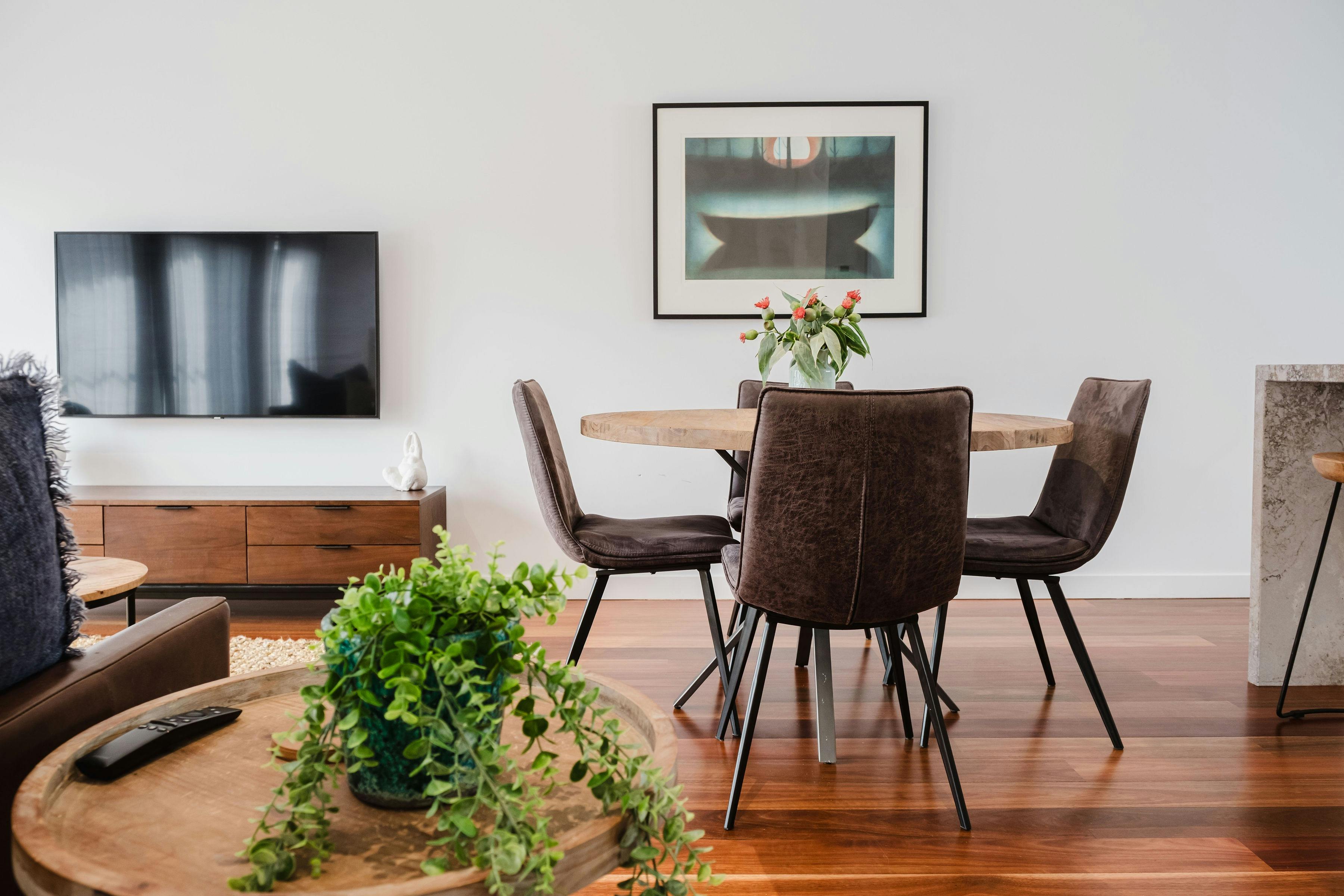 Hester arthouse townhouse dining area with dining table and four chairs
