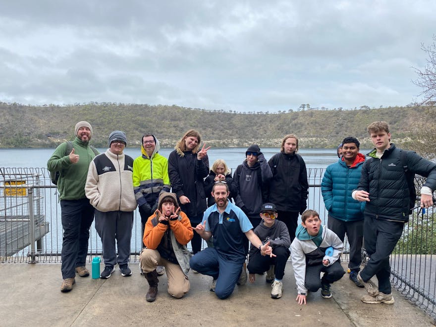 Access Adventure Club staff and participants smiling together in a group photo