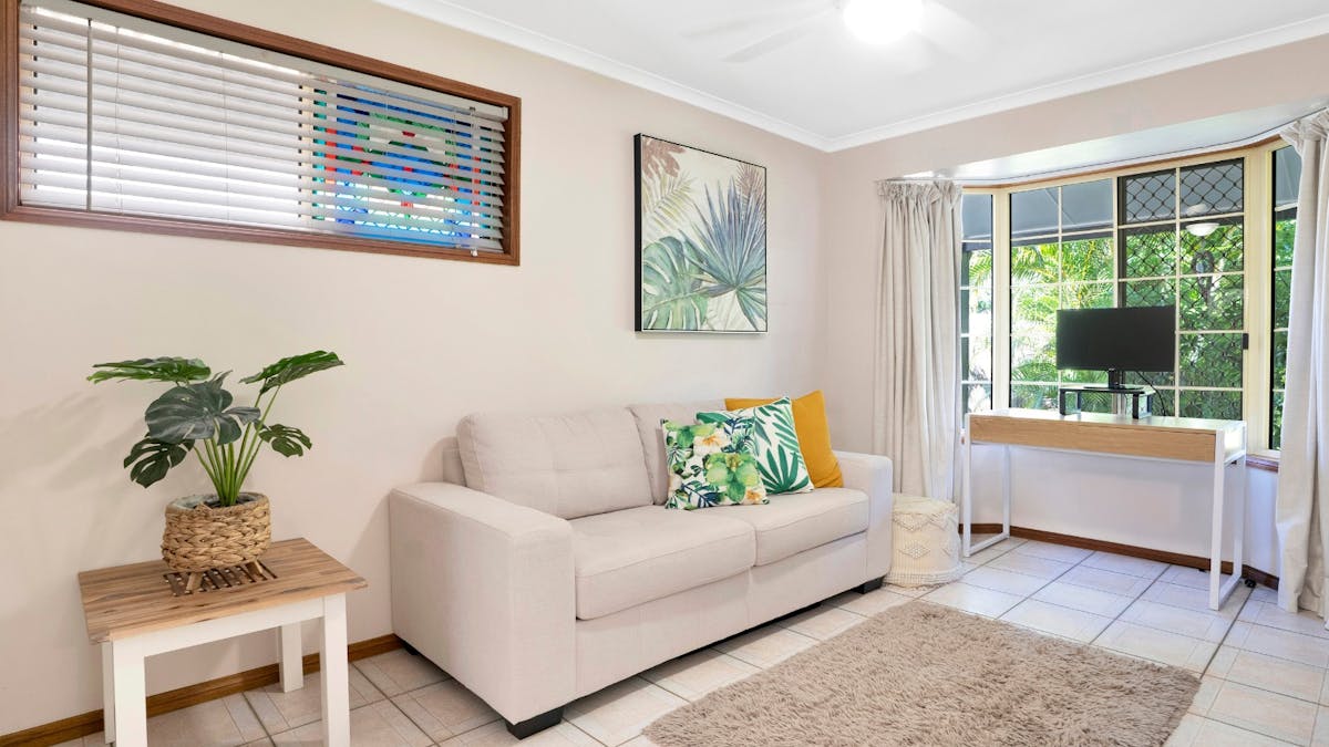 Seperate rumpus room with TV and dedicated workspace