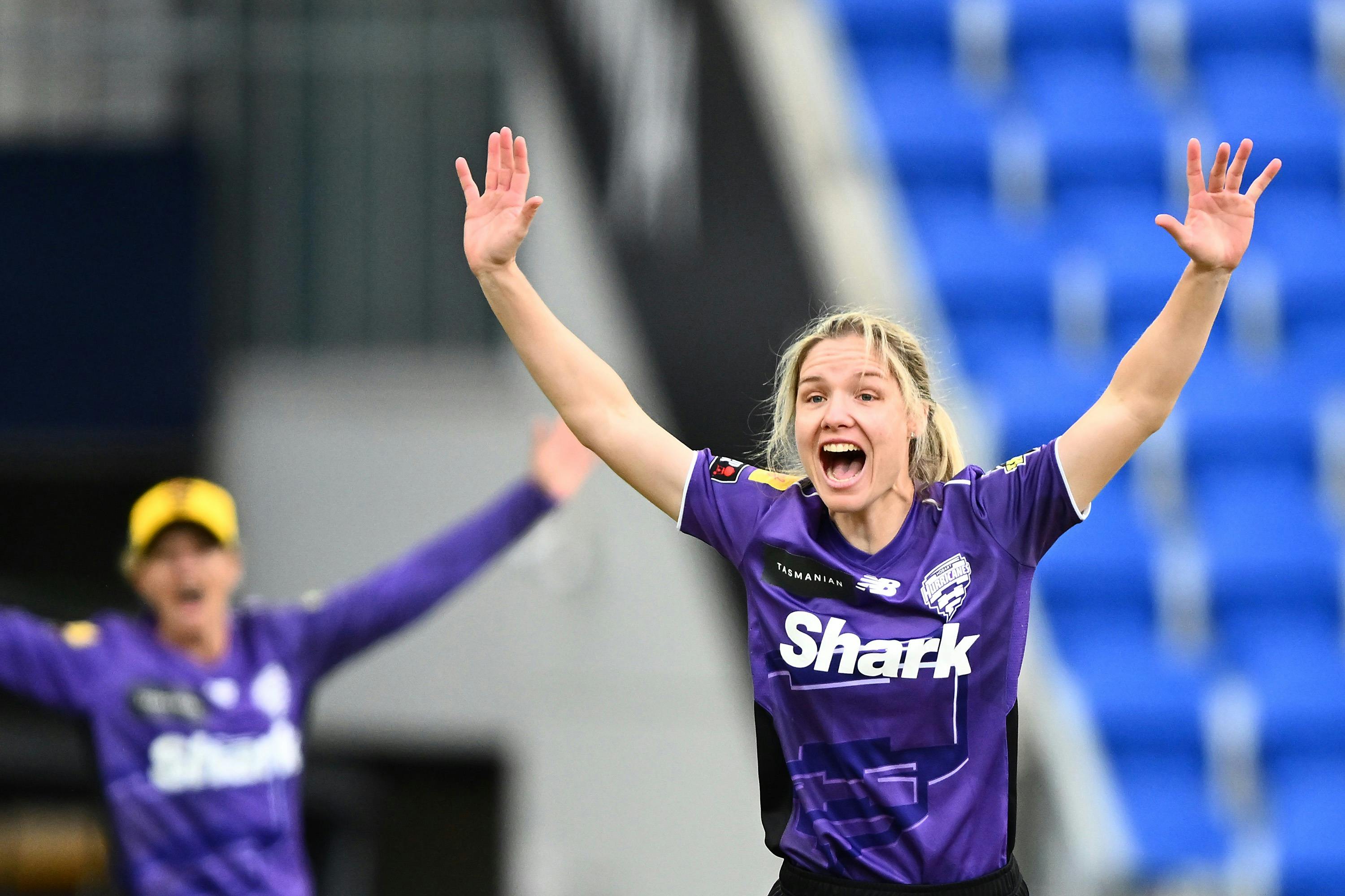 Players celebrating for the Hobart Hurricanes