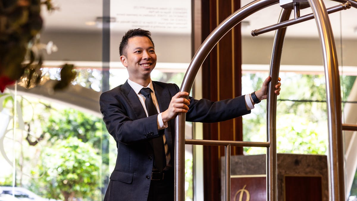Royal on the Park Hotel porter with luggage trolley