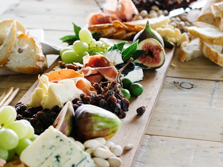 Grazing platter featuring local cheese and cured meats and other local food to share