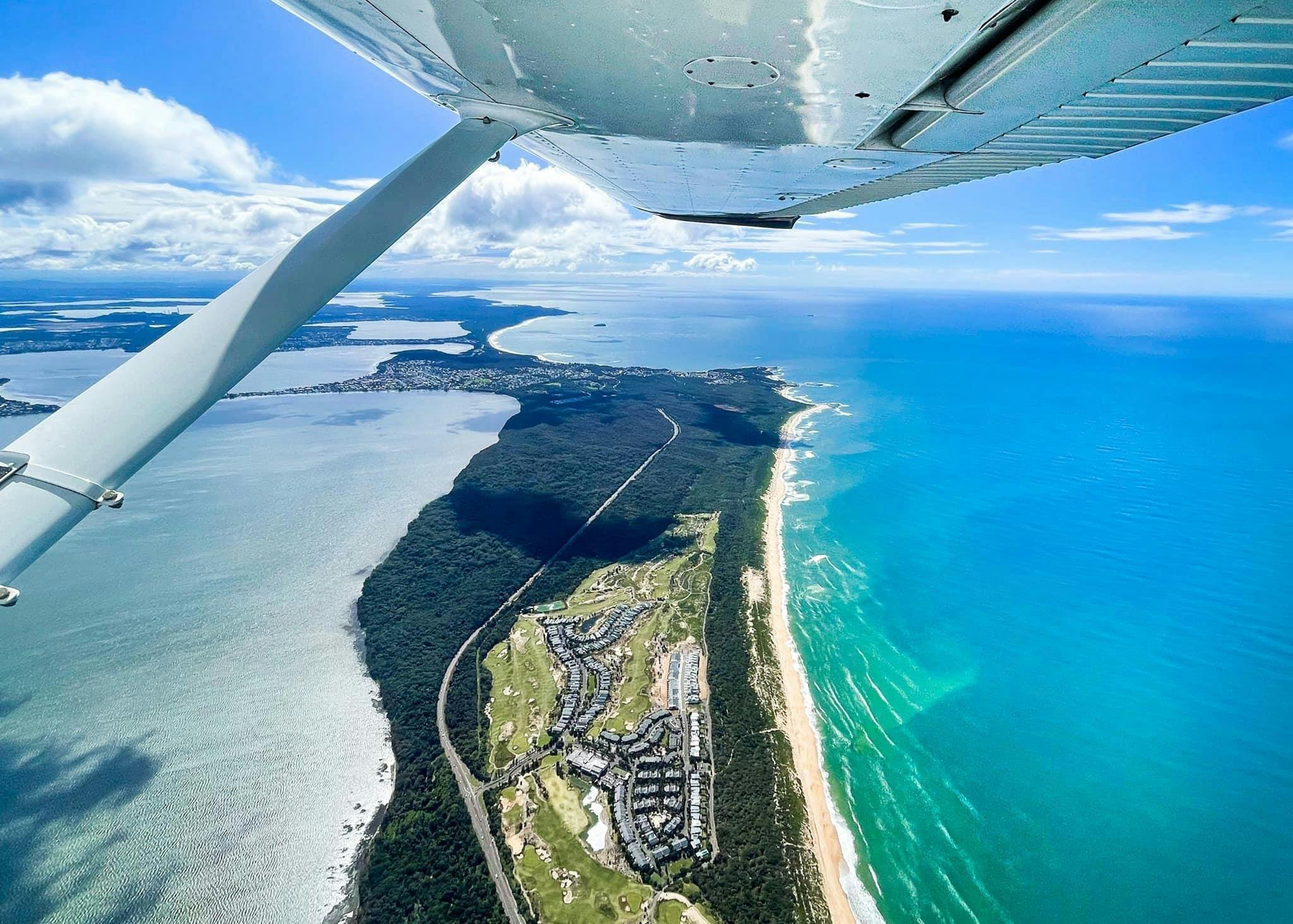 Photo taken from a scenic flight over tuggerah lakes looking north  at Magenta Shores