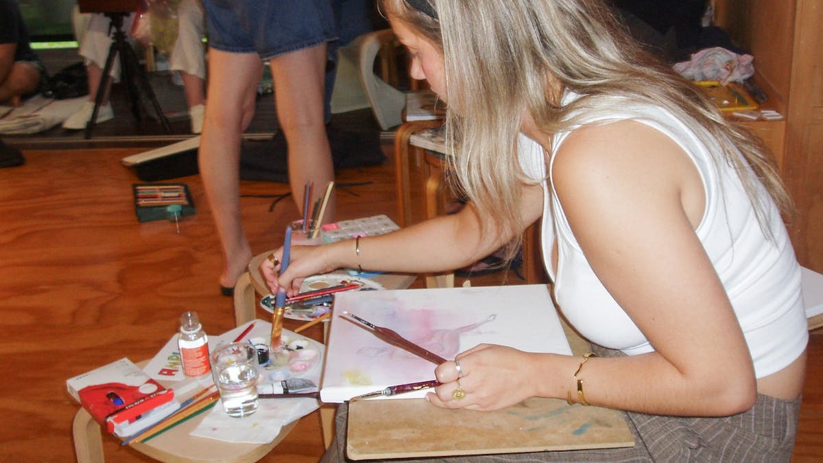 one person painting at Studio Maverik
