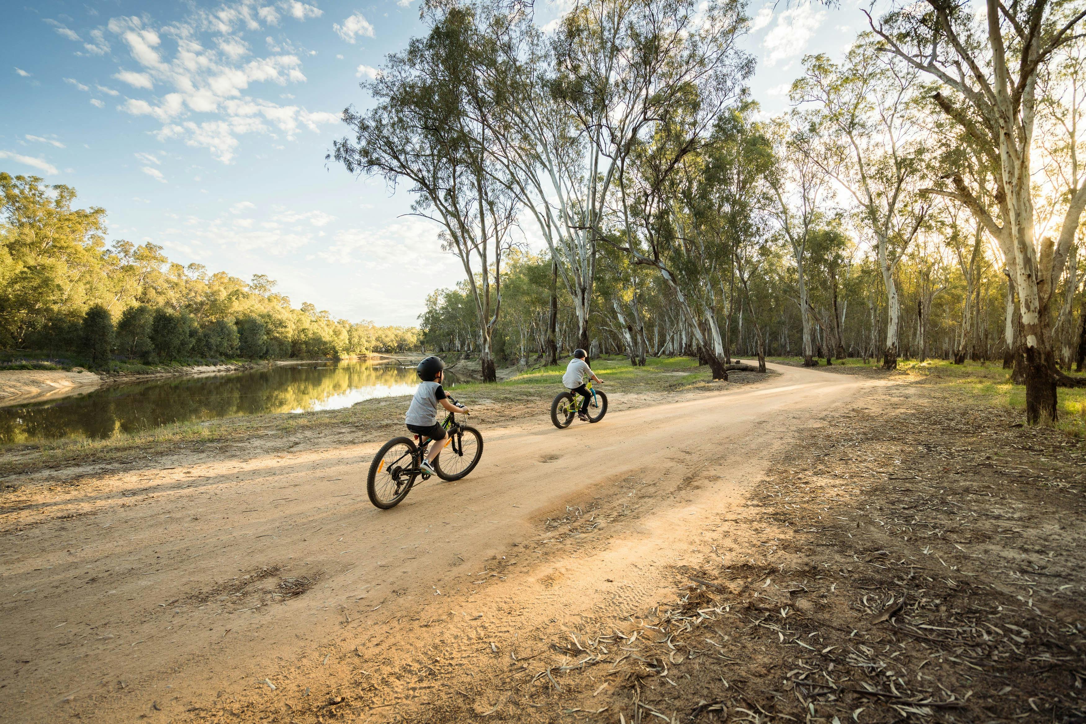 riding bikes through the park