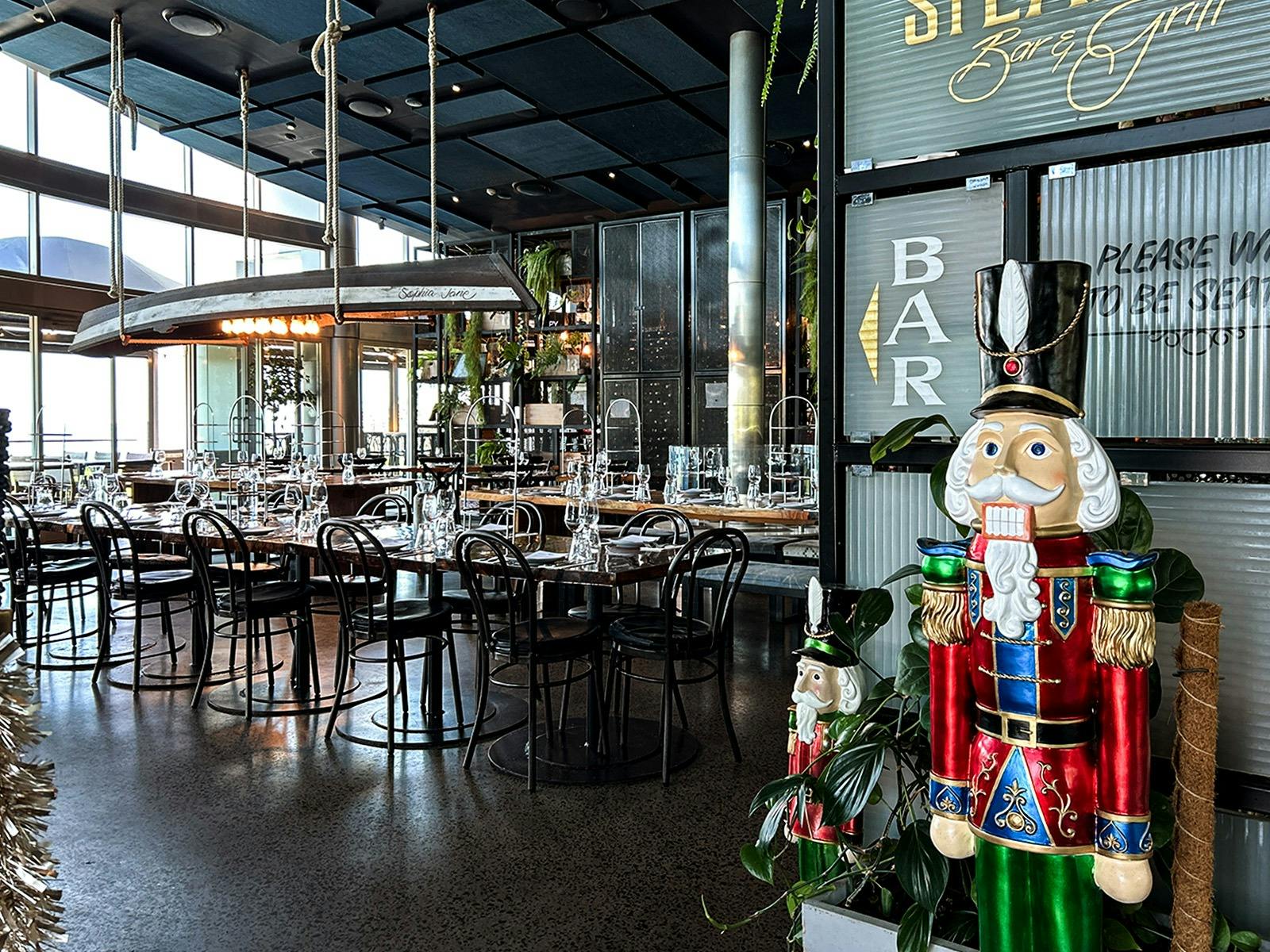 Rustic charm, nautical vibes, and stunning views set the scene for festive dining.