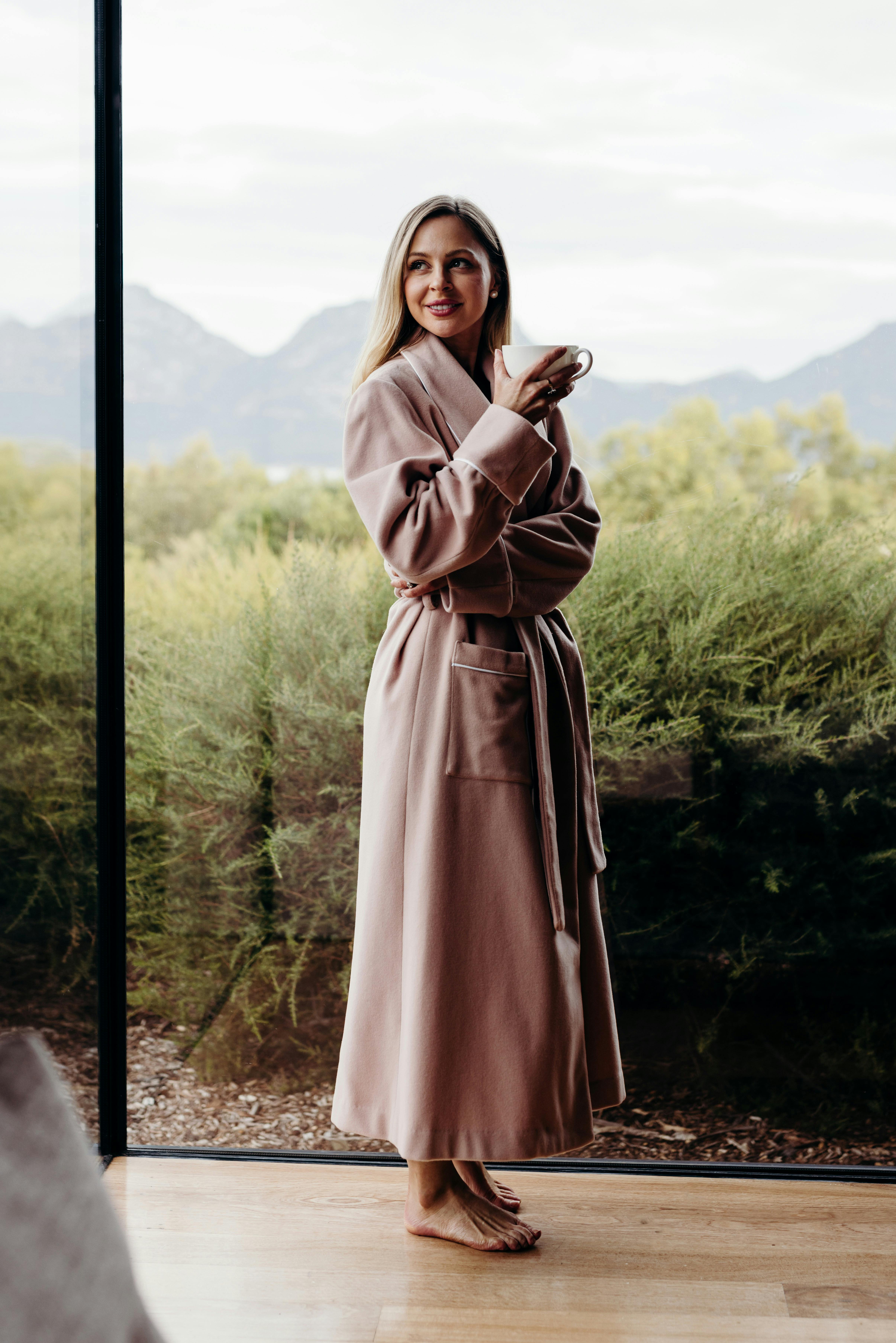 Woman in pink cashmere dressing gown