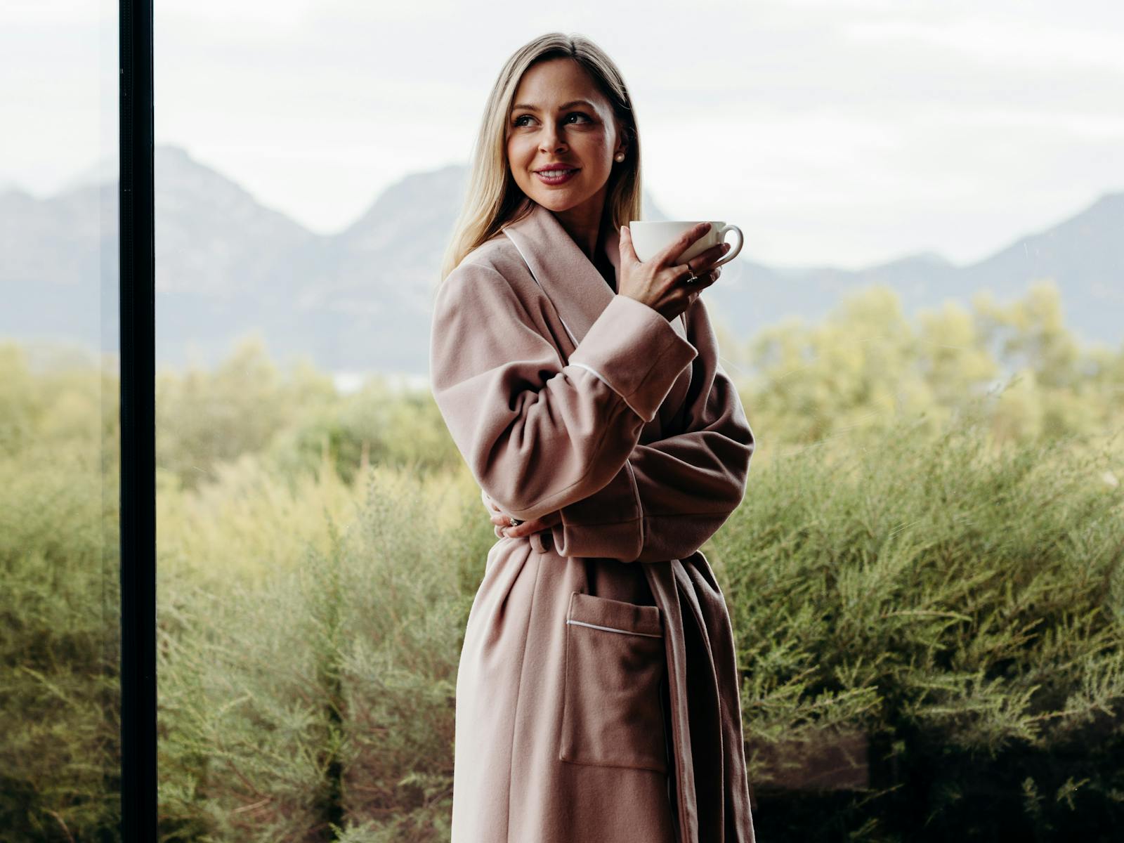 Woman in pink cashmere dressing gown