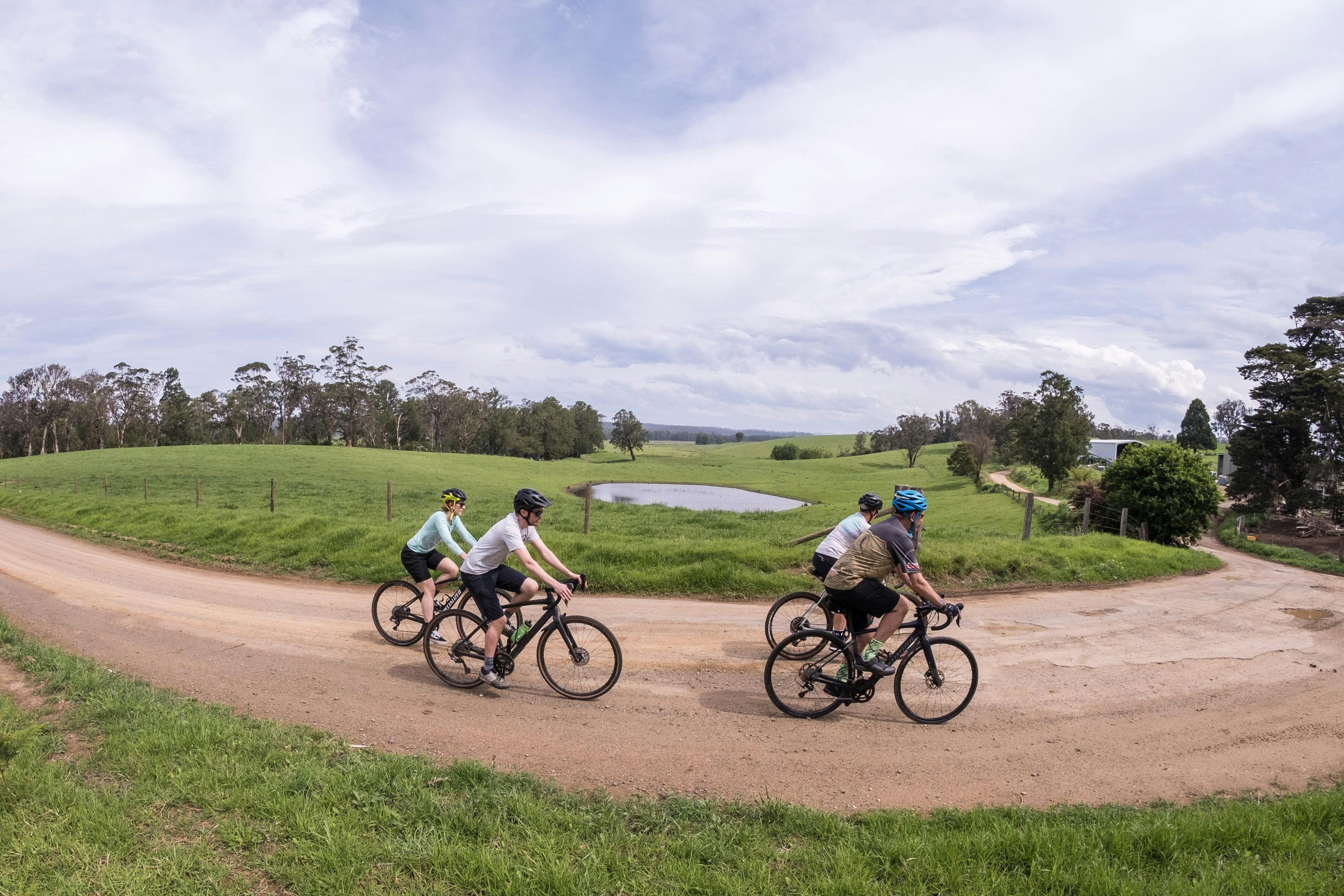 Gravel cyclists riding through farland