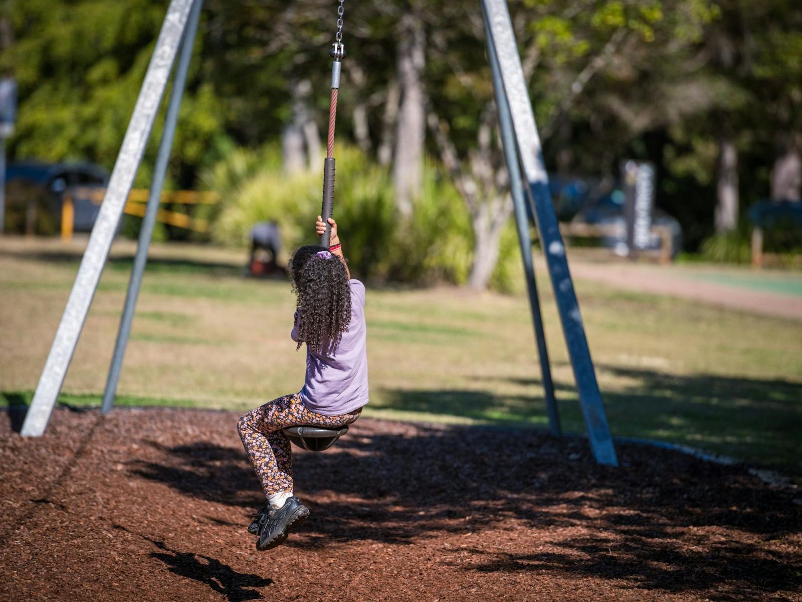 Young girl on flying fox