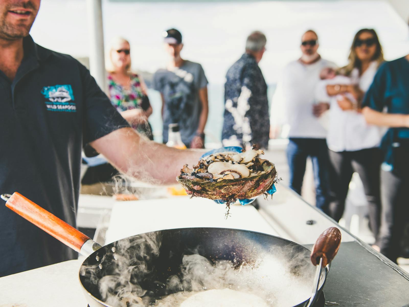 Tasmanian Wild Seafood Adventures - Fresh Tasmanian Abalone served from interactive cook station