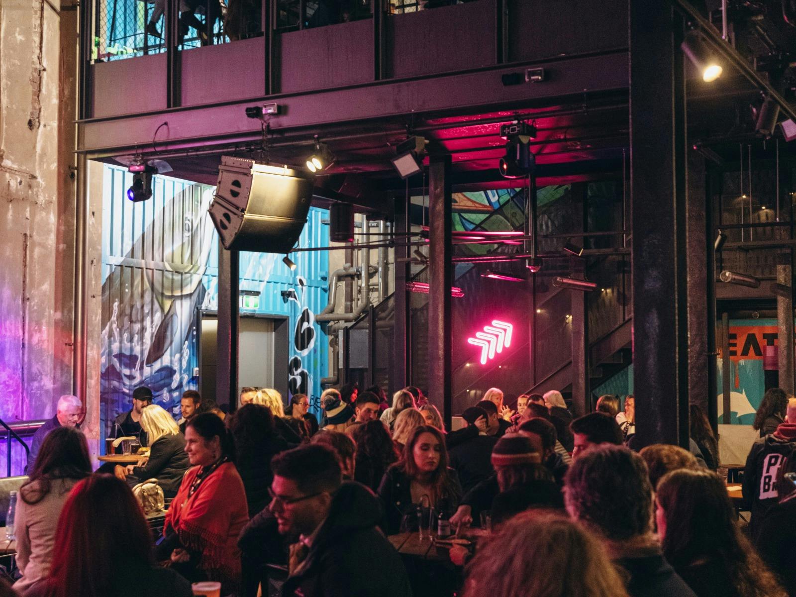 People taking part in a trivia night at The District in Adelaide.