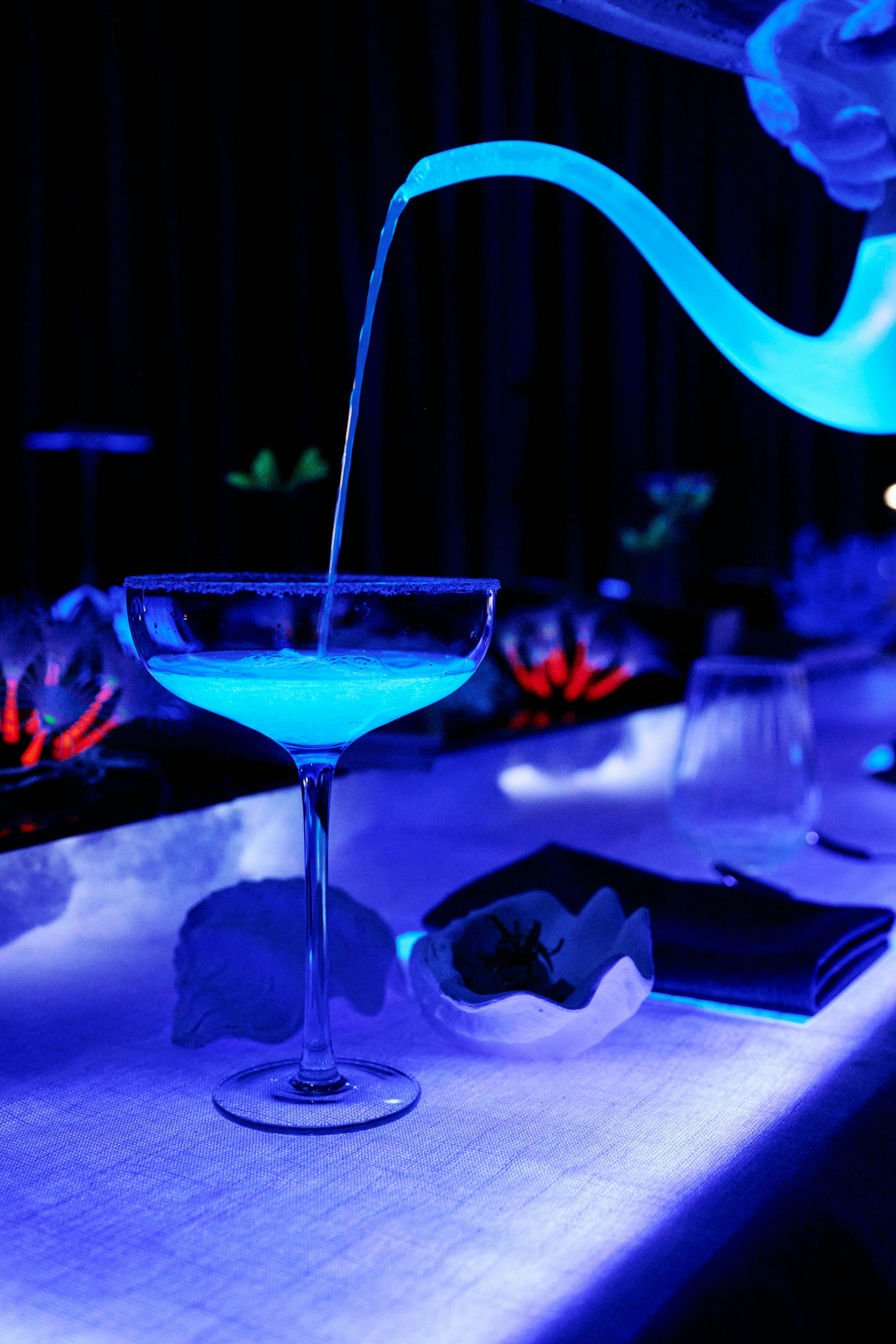 A glass is being poured