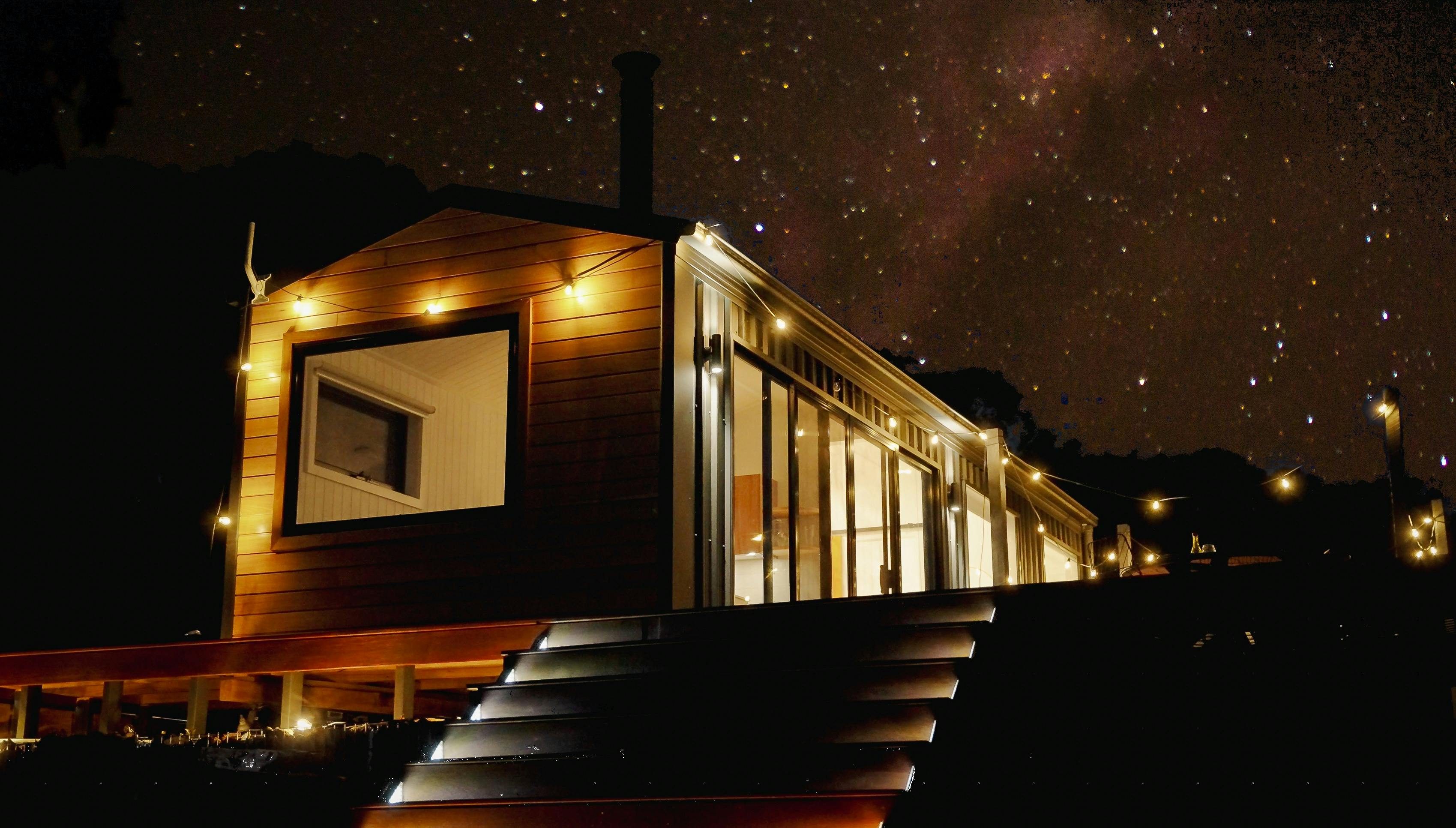 Eco Cabin view with dazzling starlit night sky and milkyway