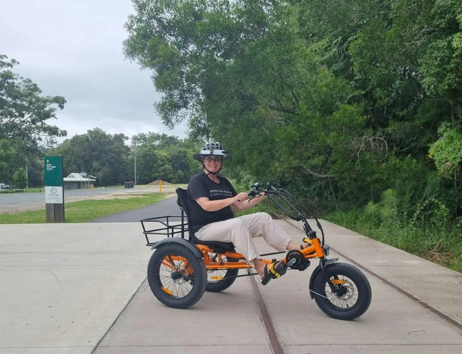 Woman riding Trident FT tricycle