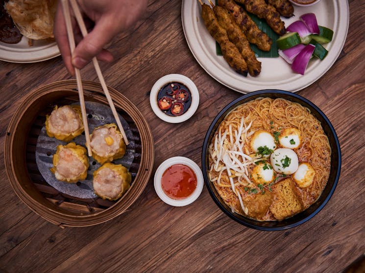 A variety of Asian hawker-style street food from Spice Alley, Chippendale