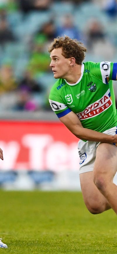Canberra Raiders player Owen Pattie passing the ball.