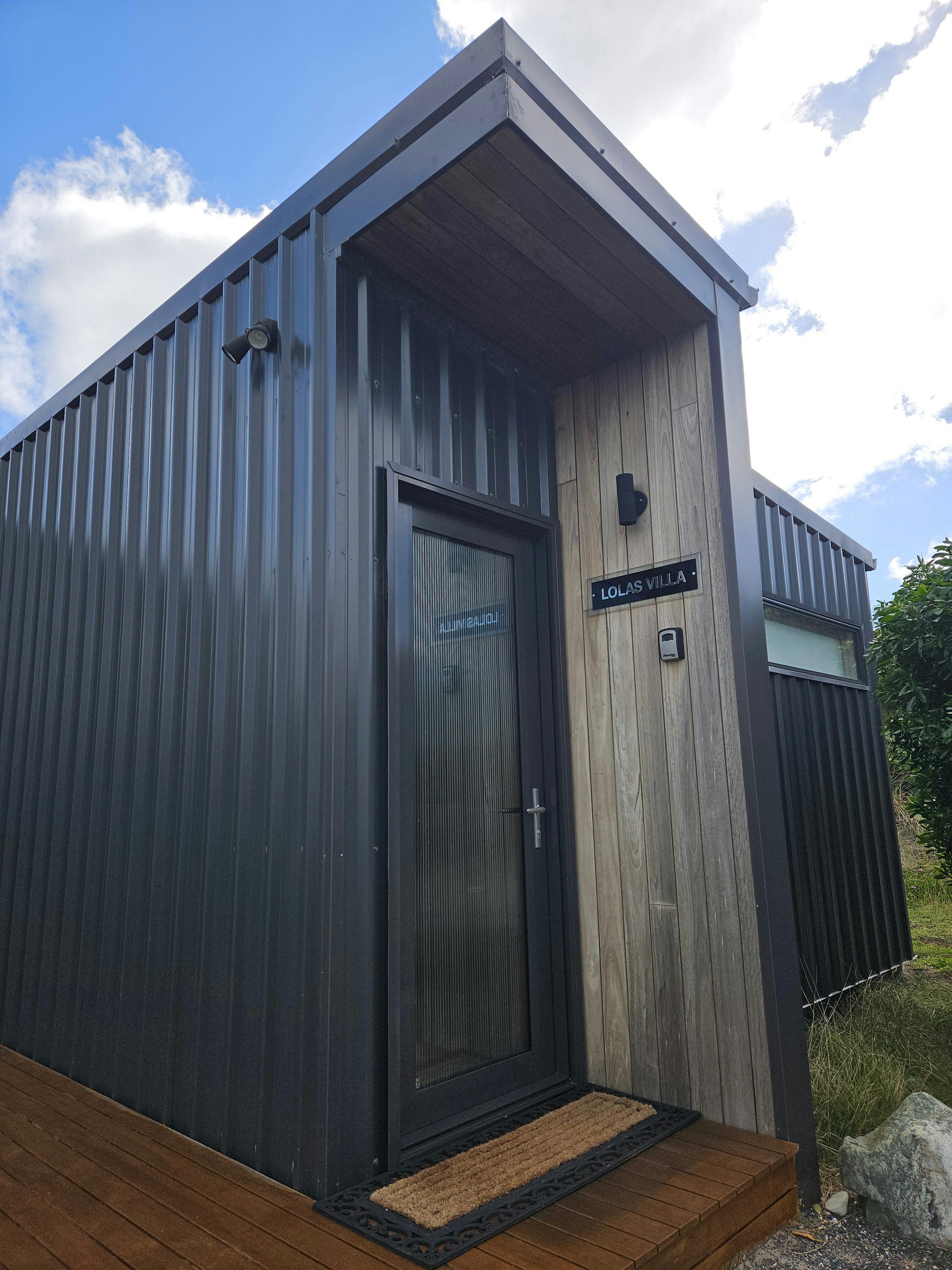 Back entrance with lock box entry