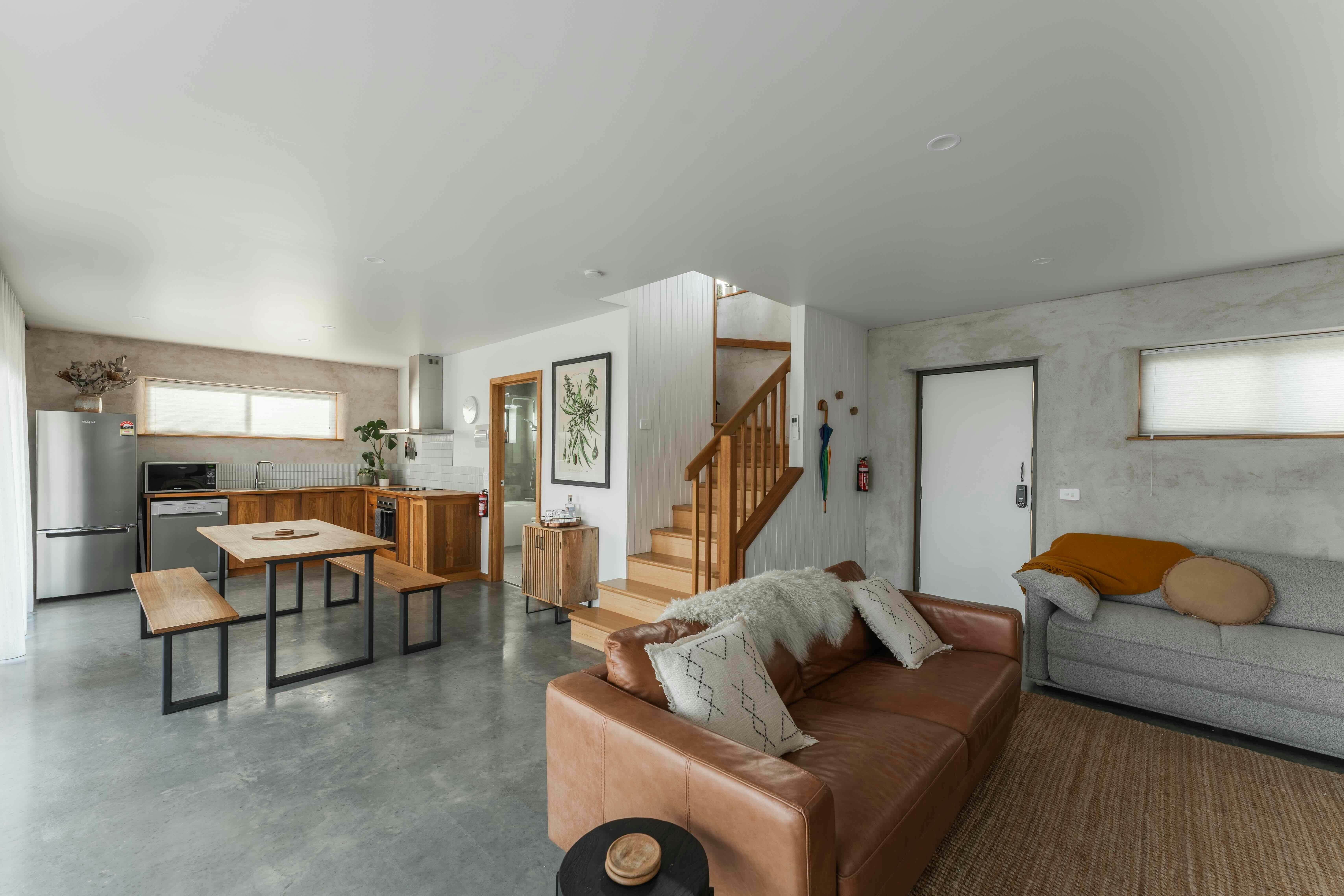 Two couches and a dining table.