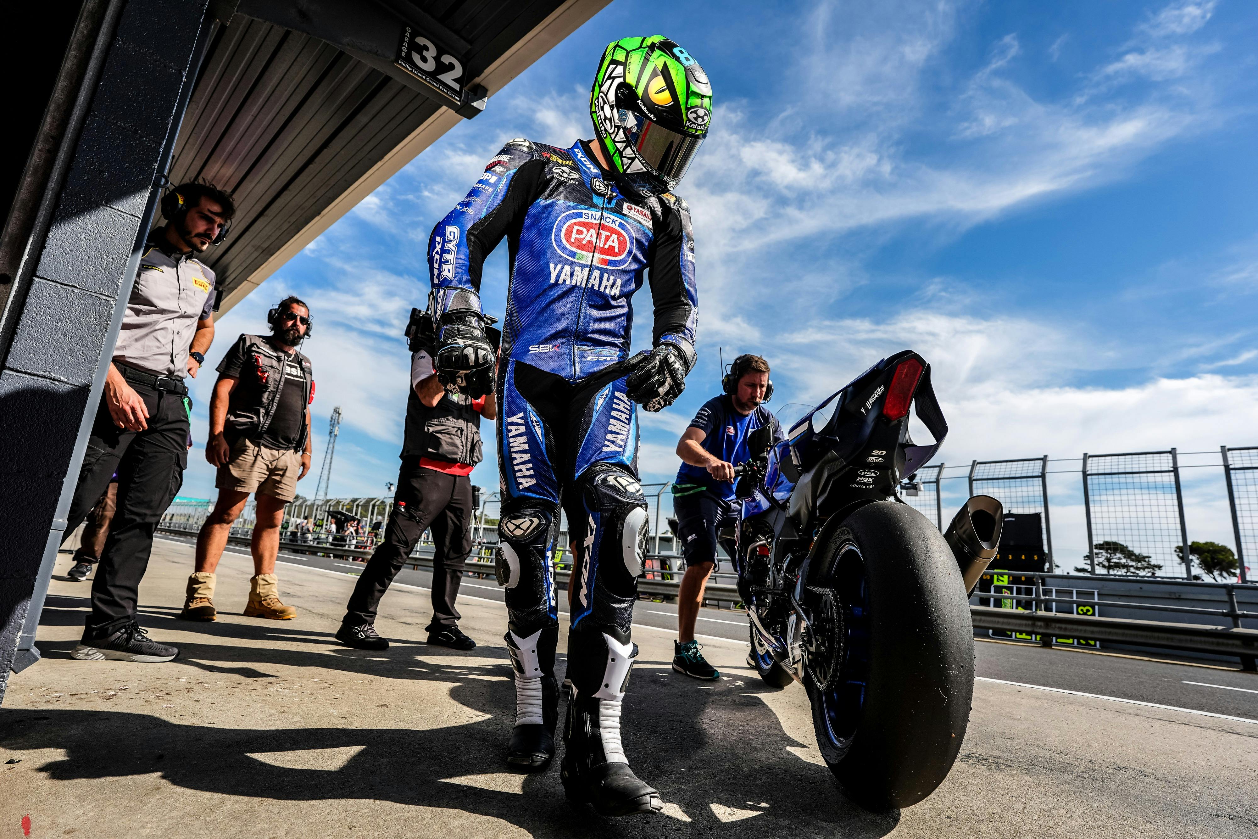 Aussie Remy Gardner walking through the pits.