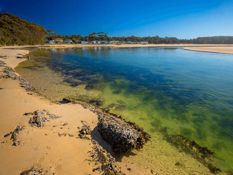 Lake mouth, beach.