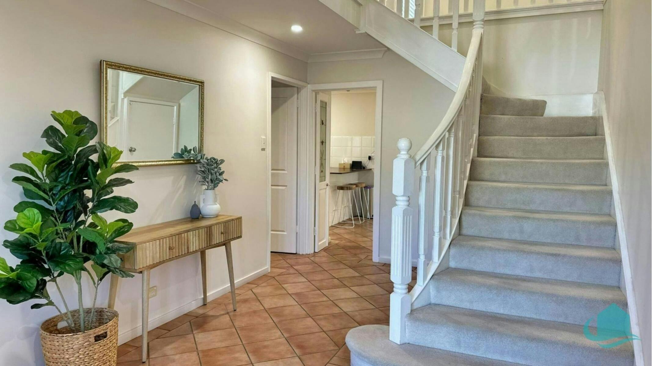 Staircase to upper level in foyer