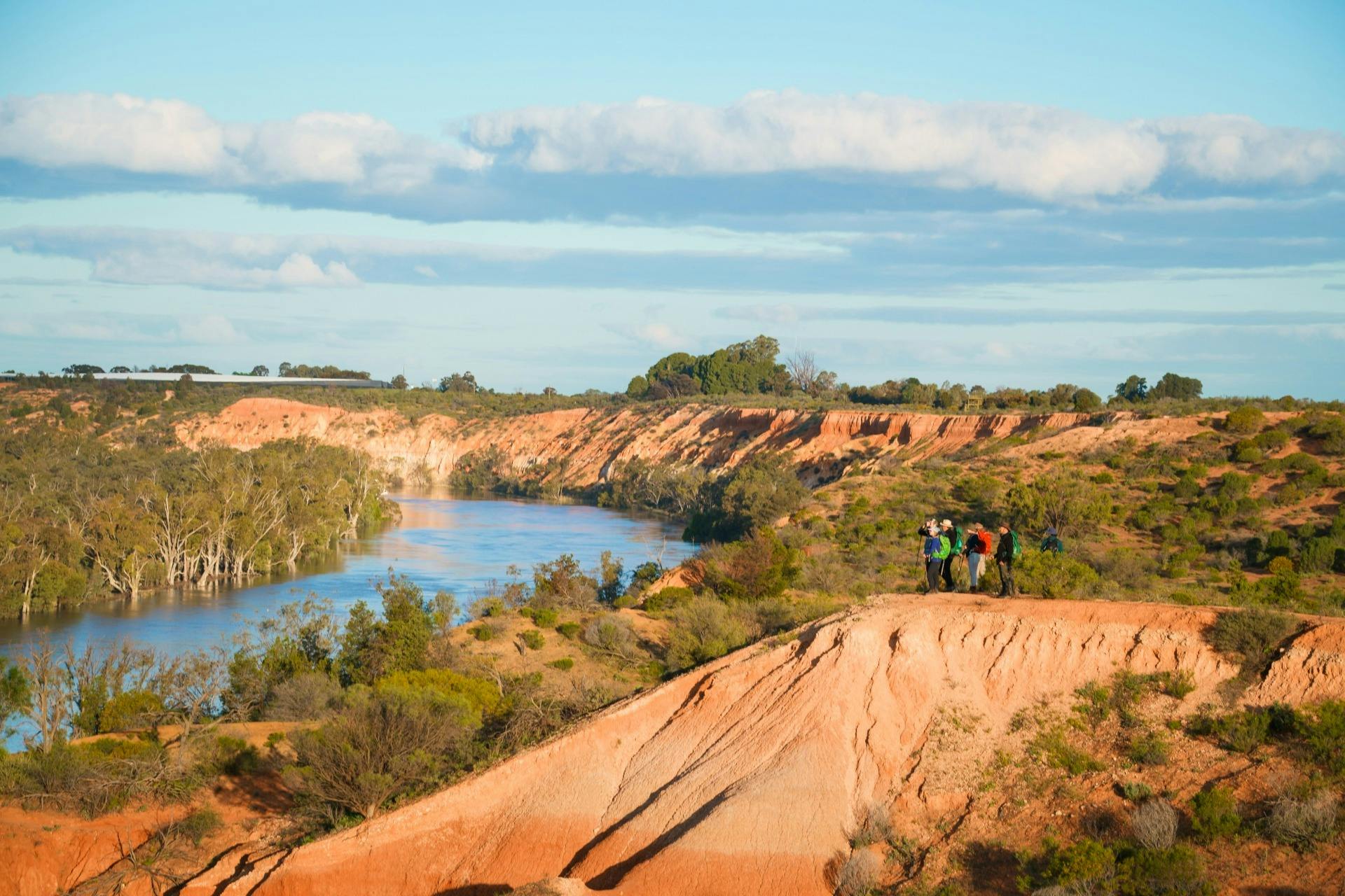 Walkers looking over the river valle