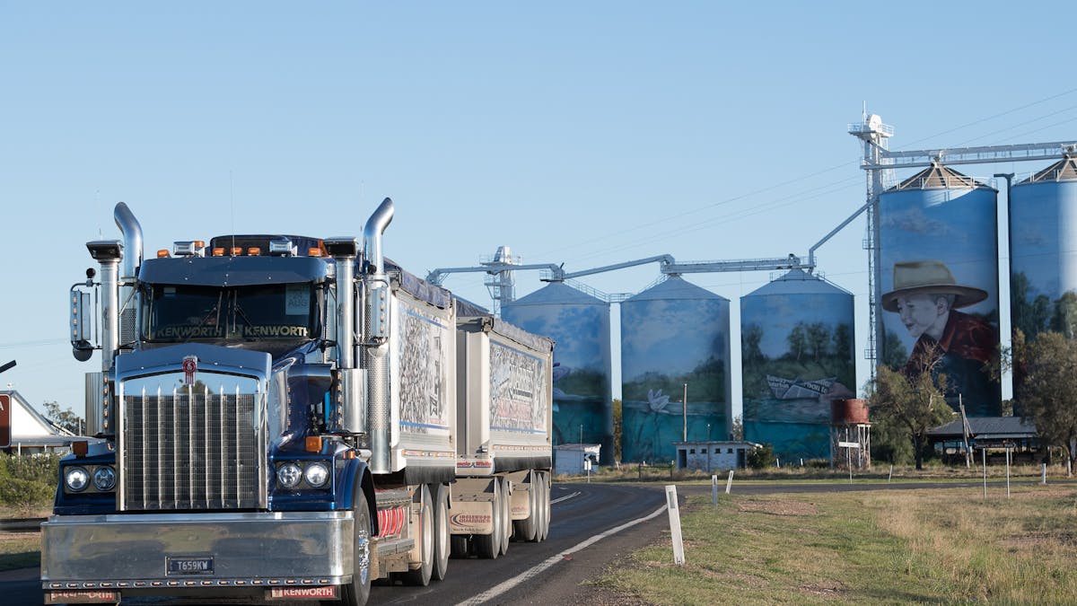 Yelarbon Silos with truck driving on the highway