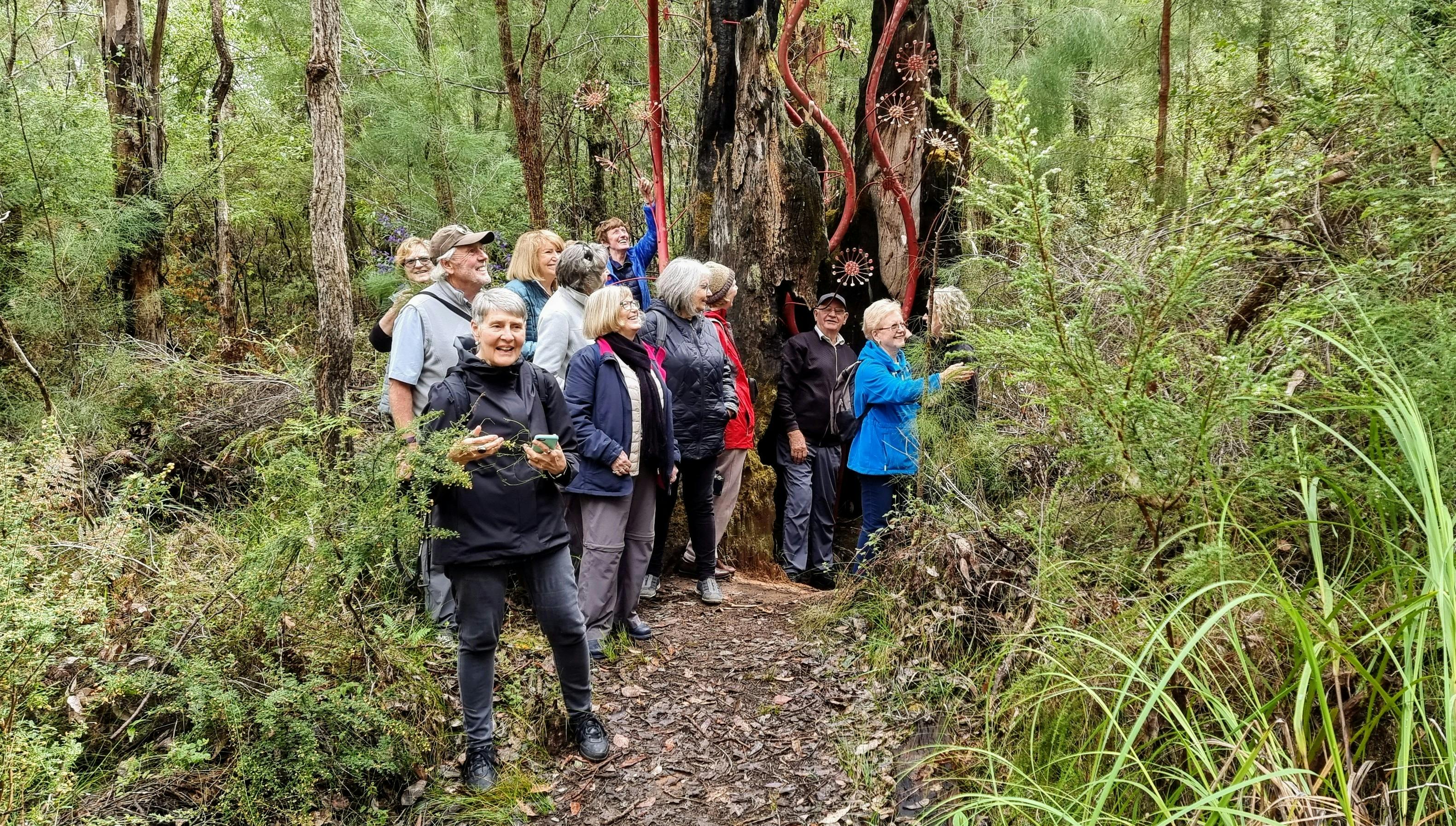 A group of people at Understory guided wildflower walk