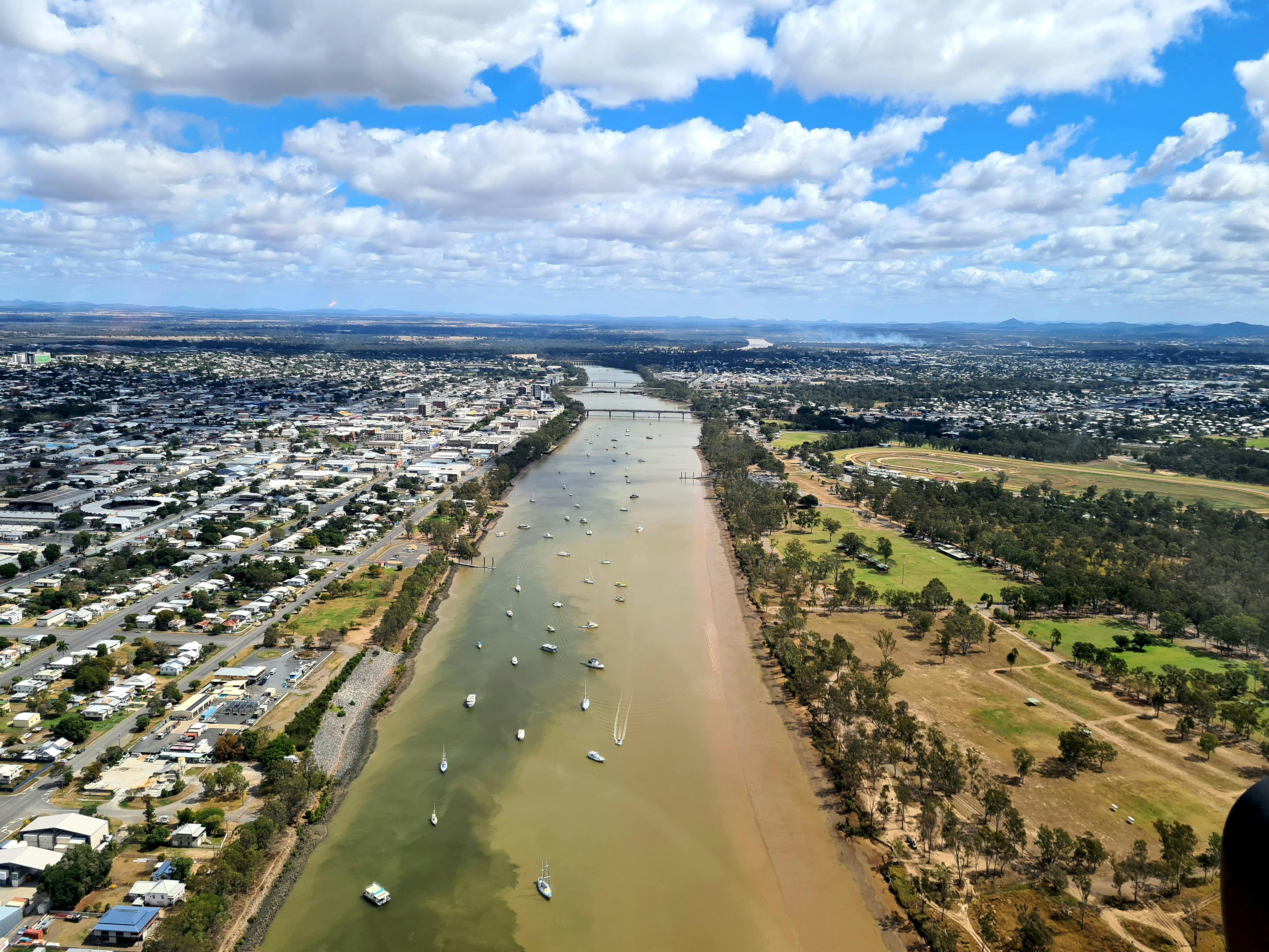 Photo looking down the fitzroy river with Rockhampton city on each side