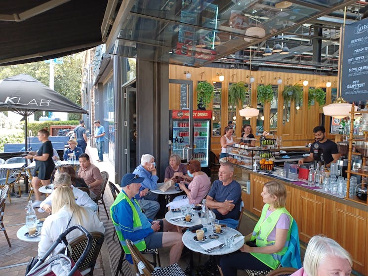 Visit cafes popular with the locals