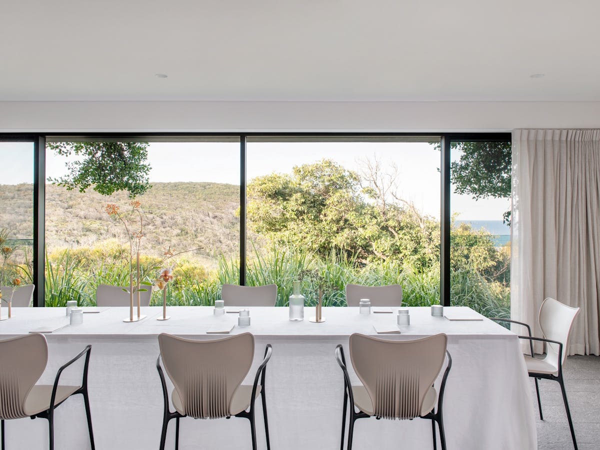 Modern conference room with natural light and ocean views at Domic Noosa