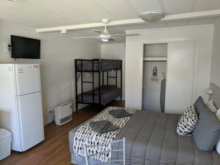 MOTEL AOpen planned motel style cabin, King Bed (or 2 king single beds) + 2 single bunk beds.