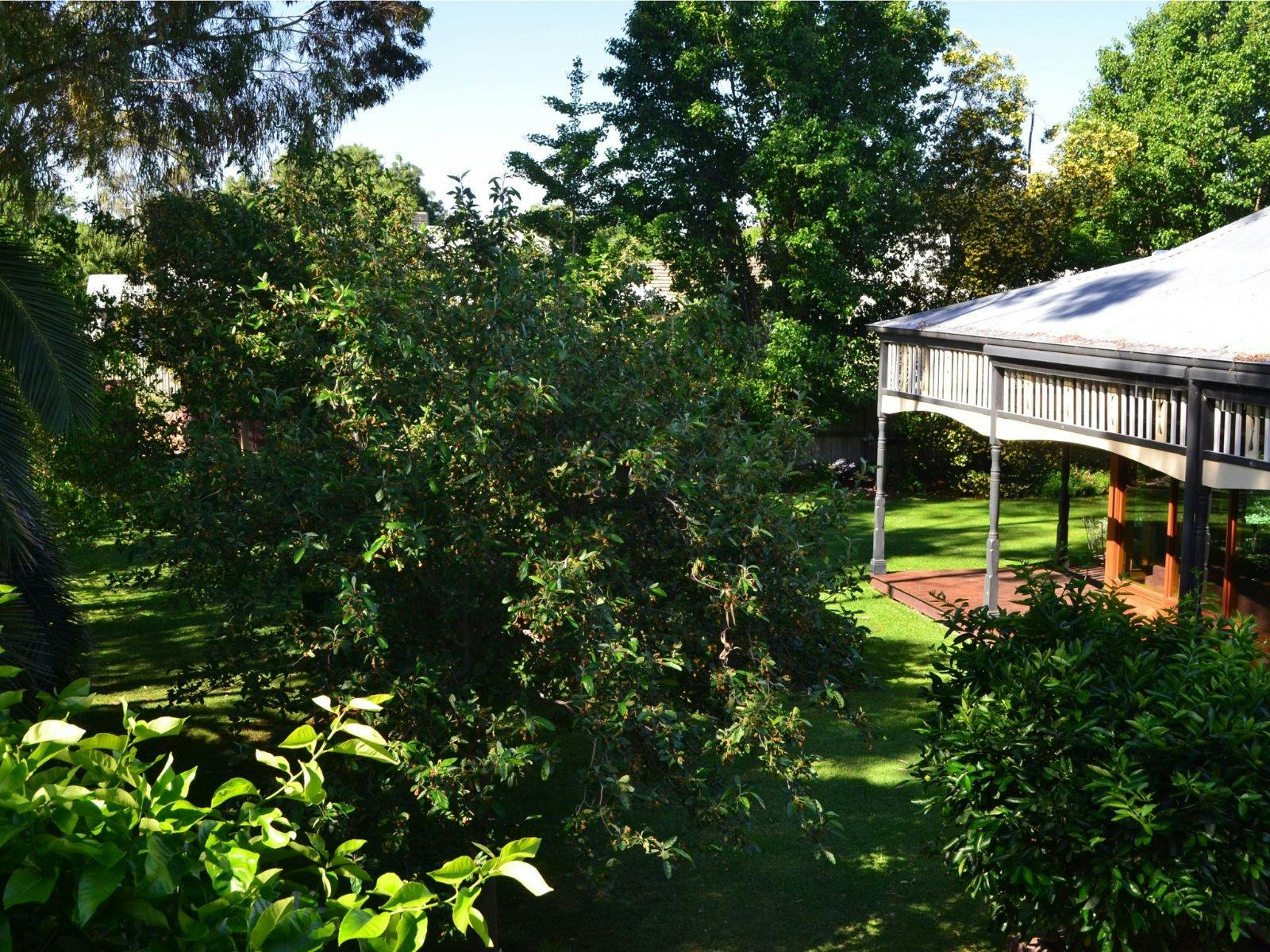 Aerial view of house with verandah and garden