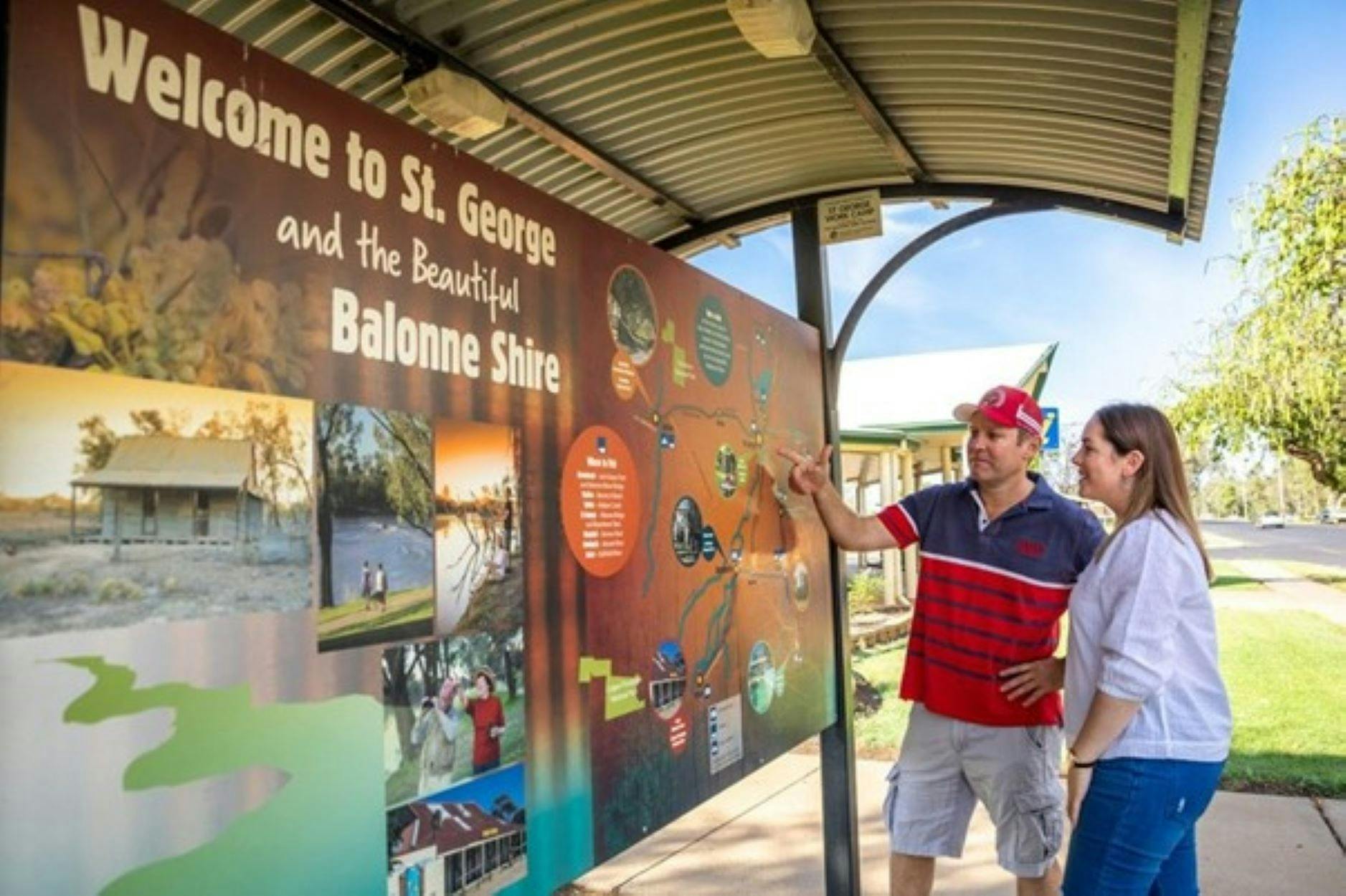 Man and Lady at the Welcome to St George and Balonne Shire sign