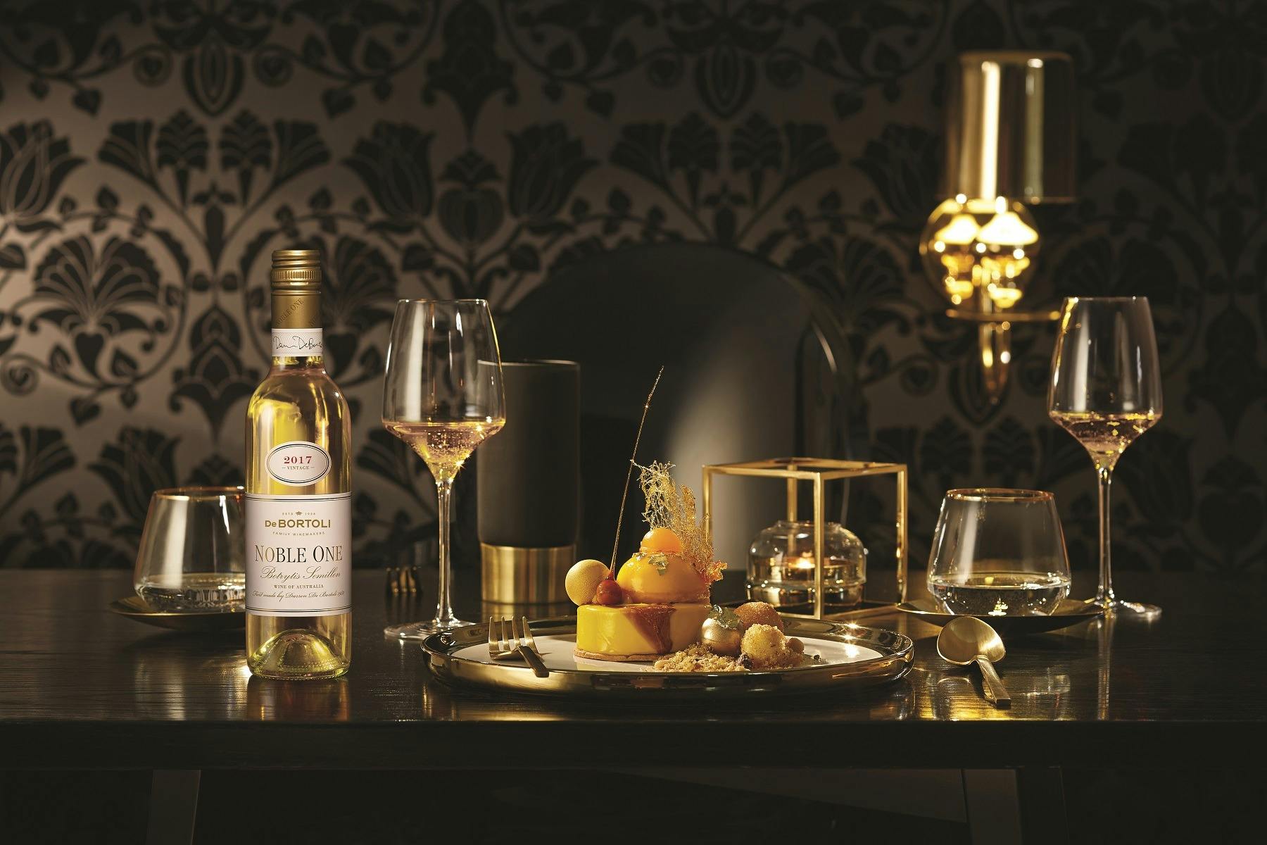 bottle of Noble One with lemon cheesecake