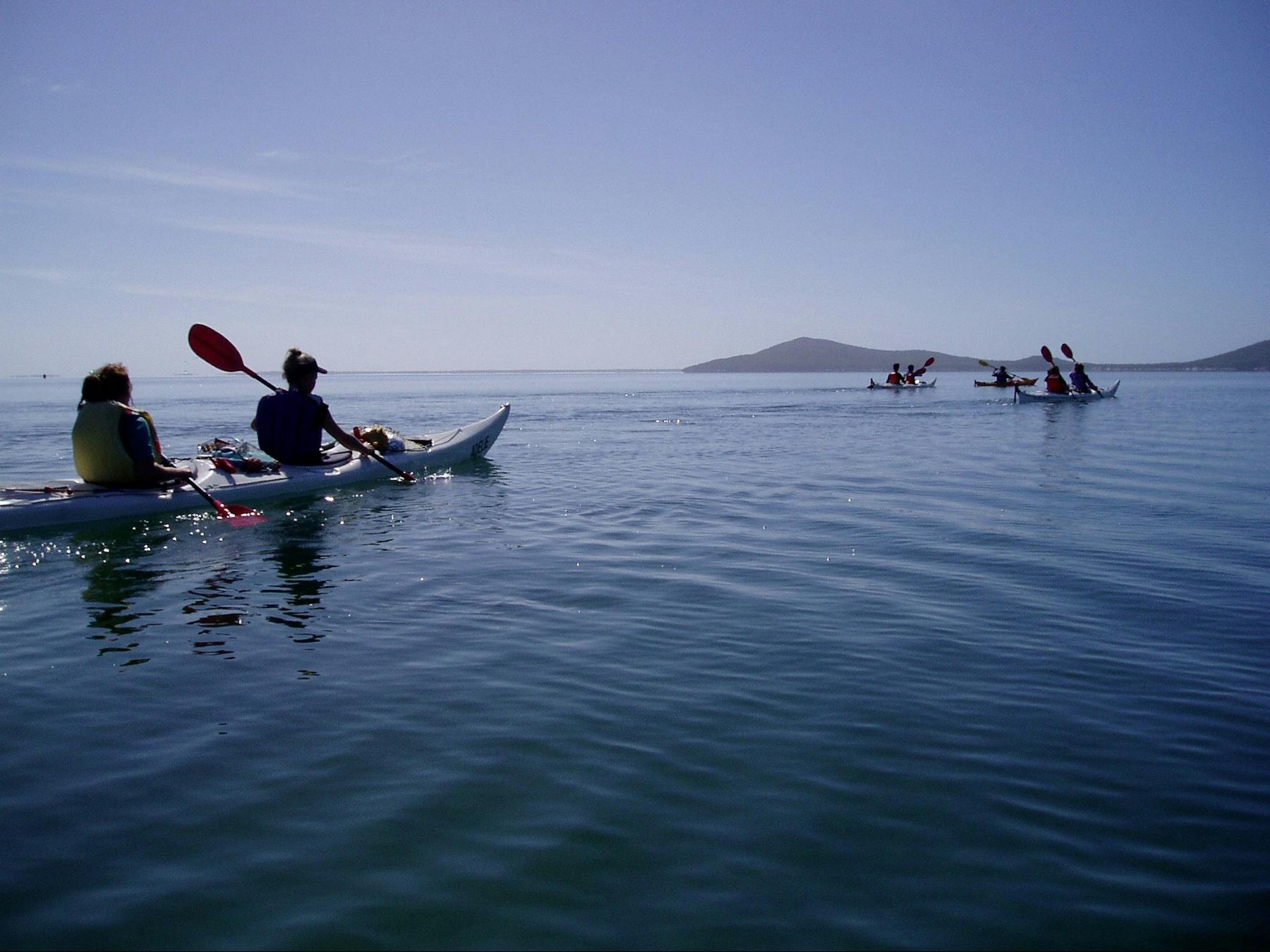 Paddling Over to Tin MIne Cove camp site on a Corner Inlet Wilsons Promontory Sea Kayak Tour