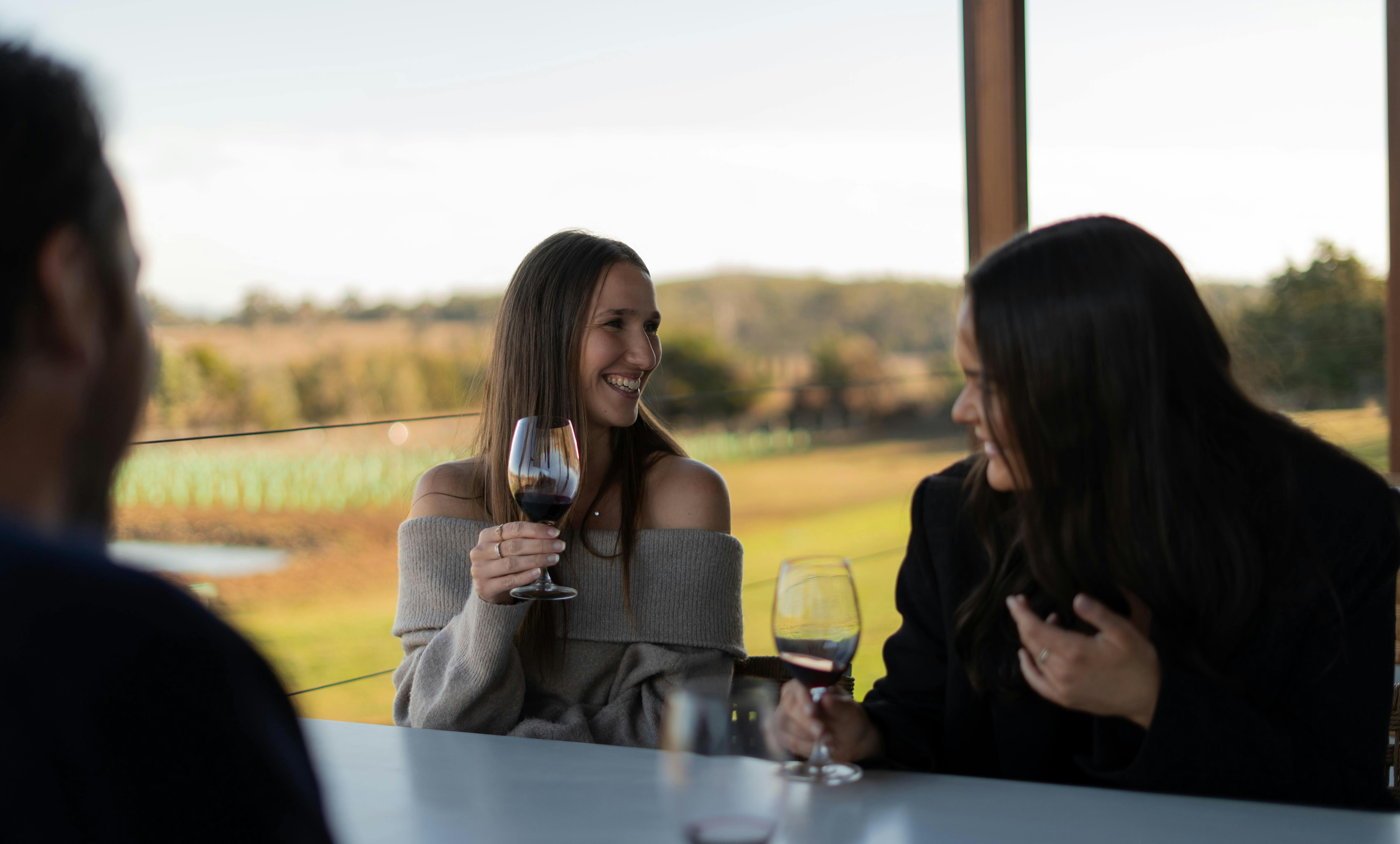 Wine Hopper guests enjoying a wine.