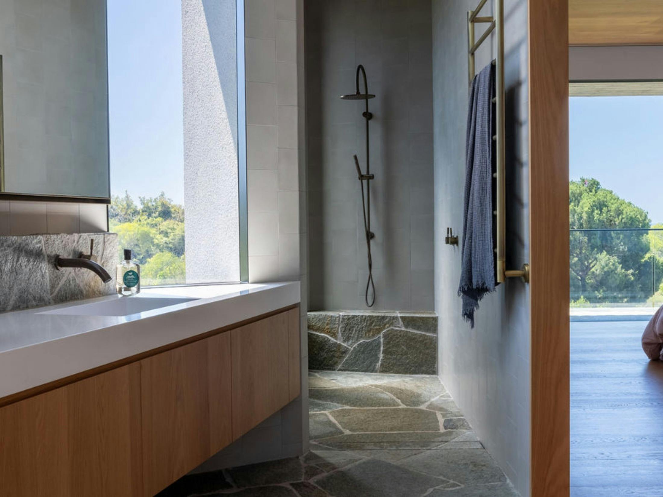 Bathroom with Vast master bedroom suite and ensuite with heated floor