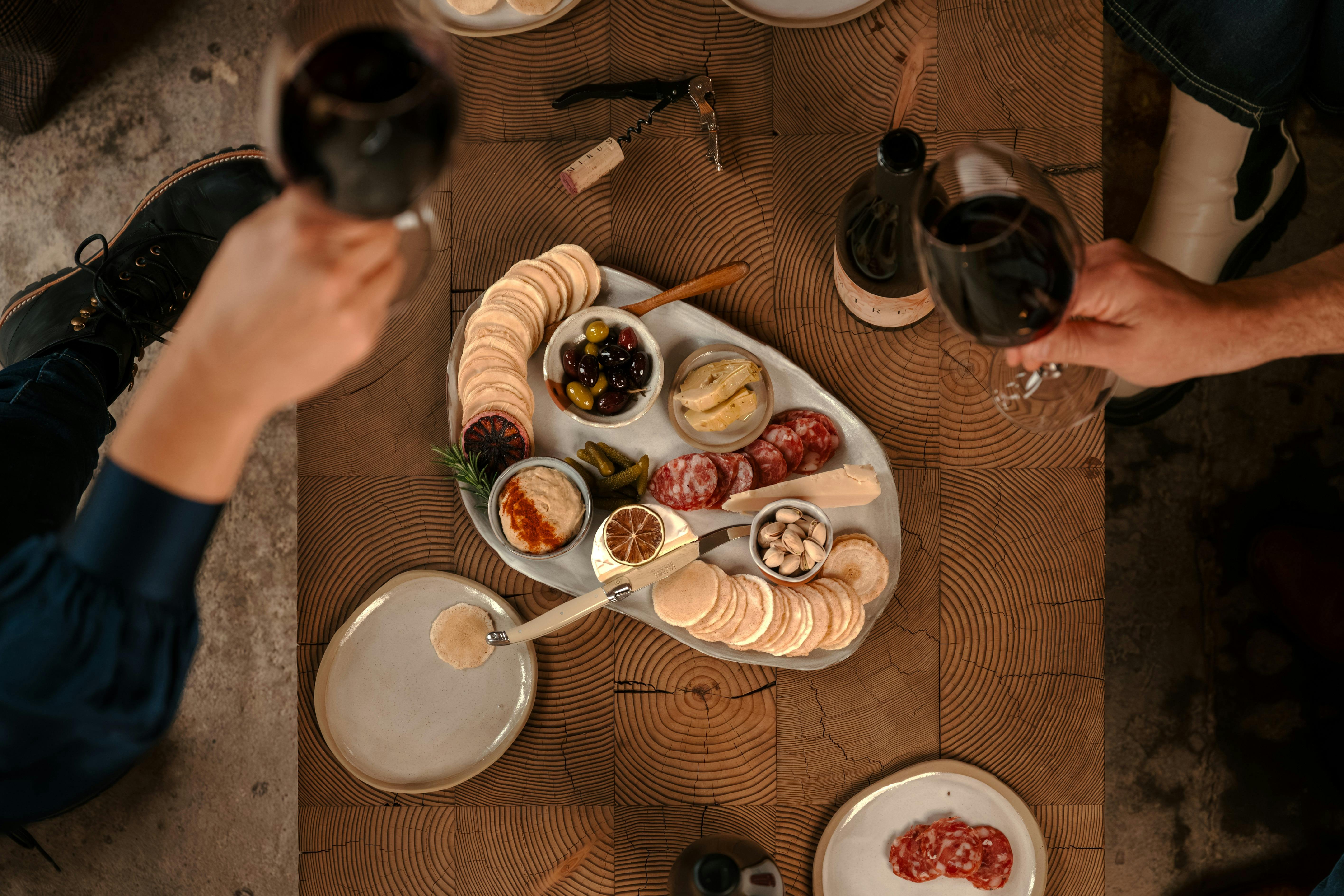 Enjoy a glass of wine and a chucaterie cheese platter in the Art and Wine Lounge in Barossa