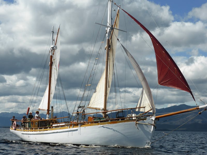 Kerrawyn under full at Port Davey on the West Coast of Tasmania during our circumnavigation in 2021