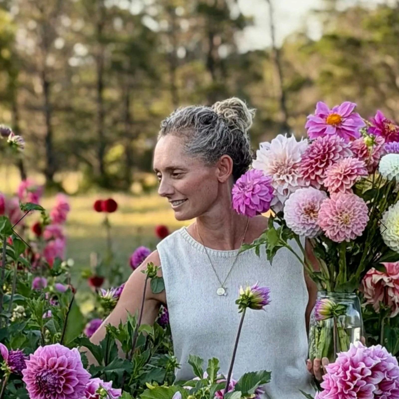 Lady picking flowers