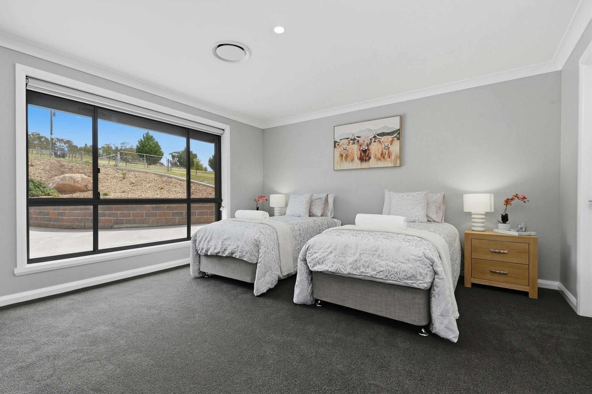 2 single beds with large window, bed side tables and ensuite