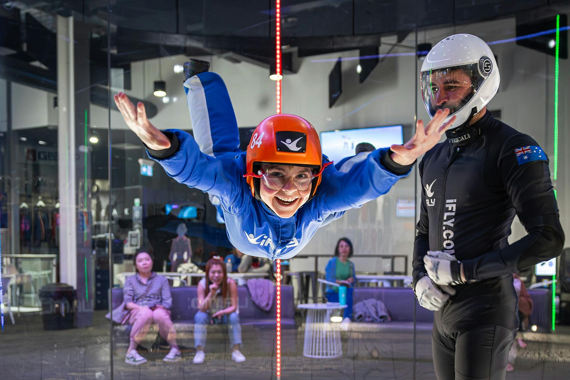Young kid smiles while flying