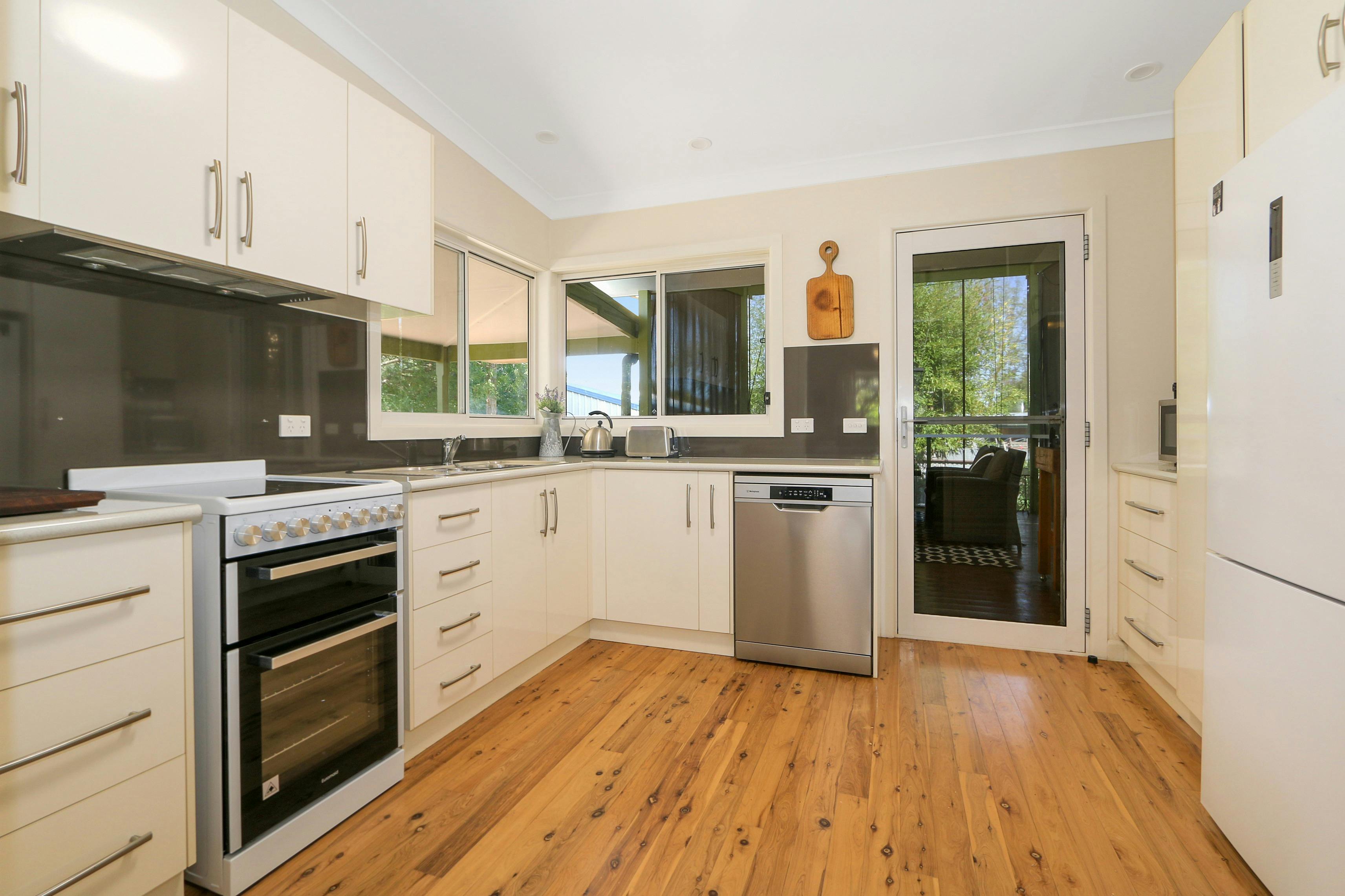 Kitchen with appliances and spacious area