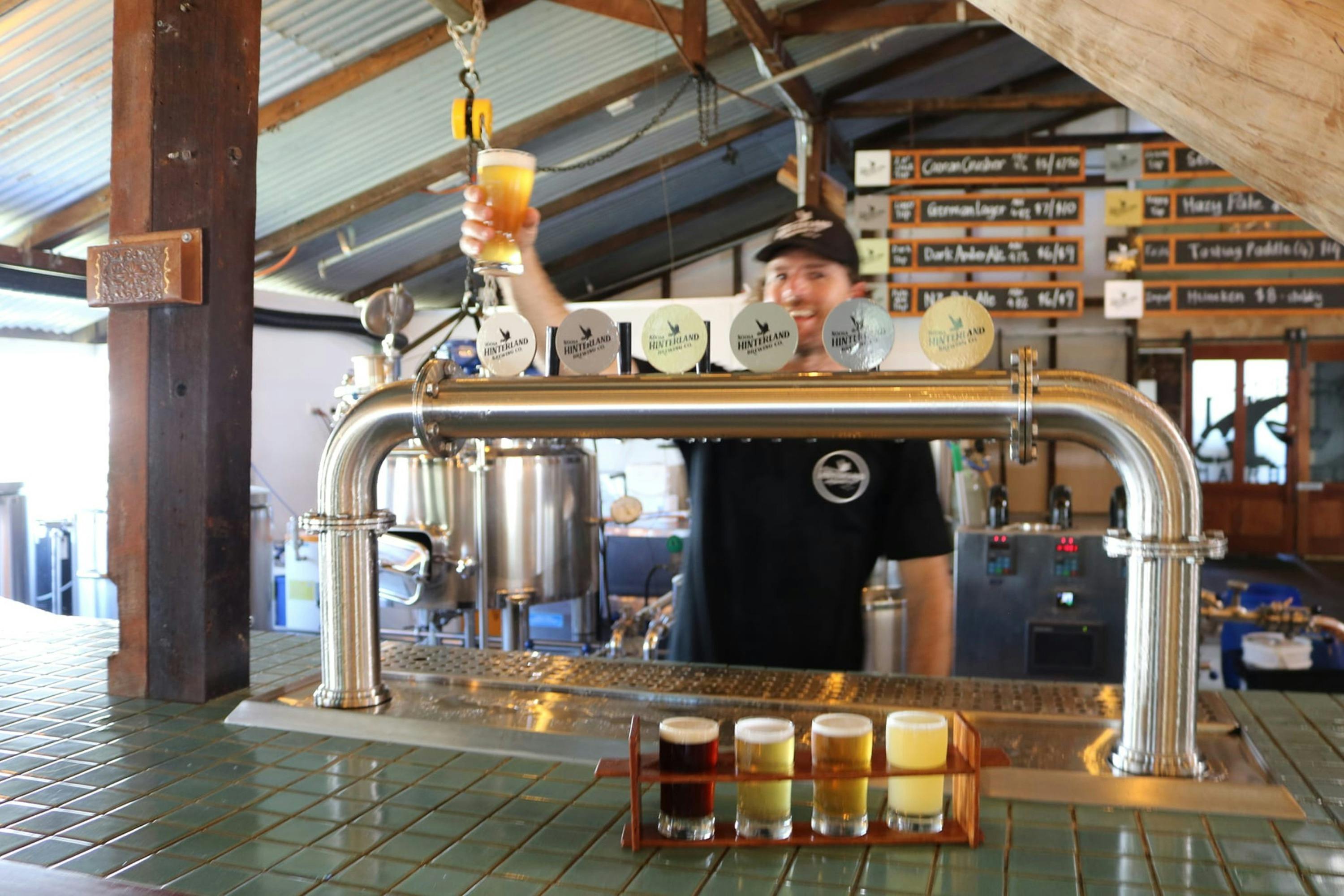 Take a seat at the bar and watch the brewing process in action at Noosa Hinterland Brewing Co.