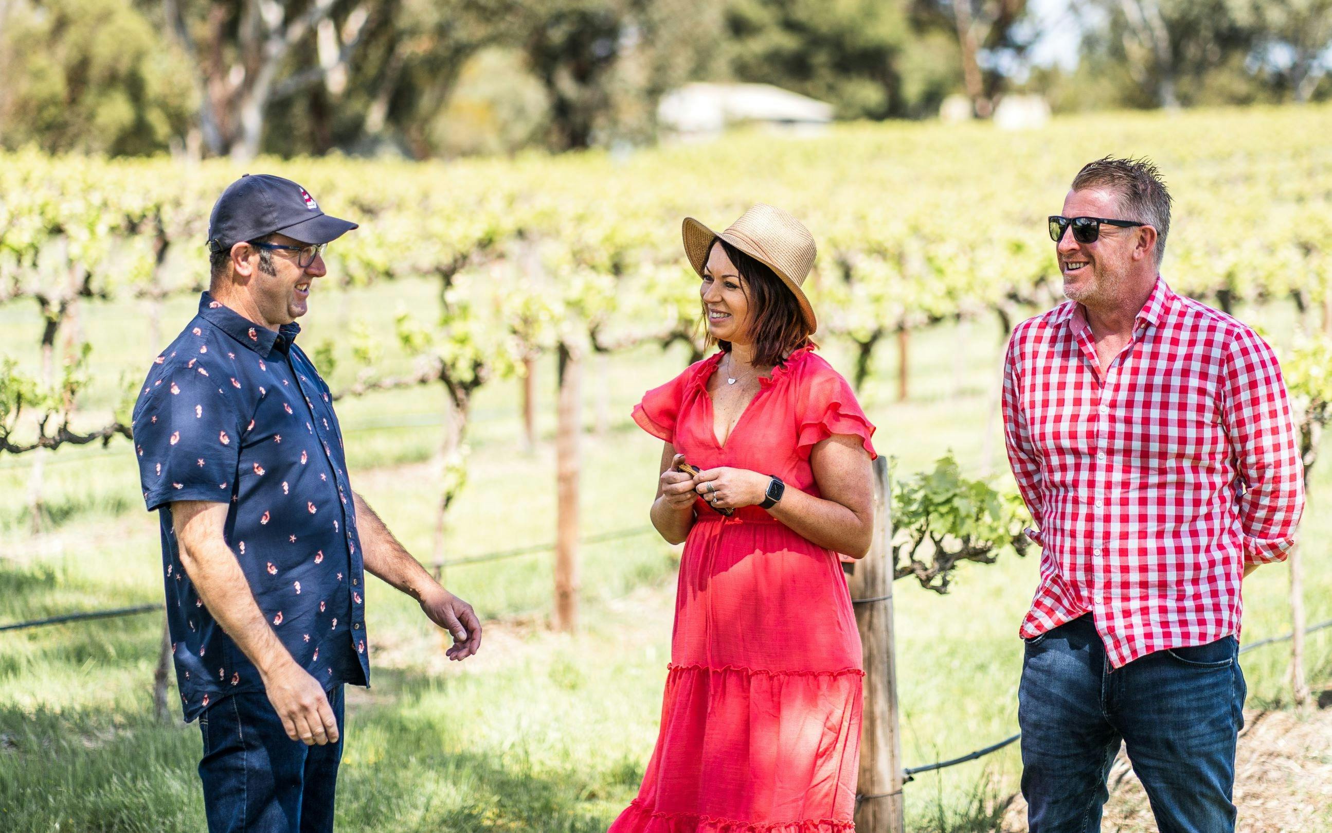 People standing in the Paisley vineyard