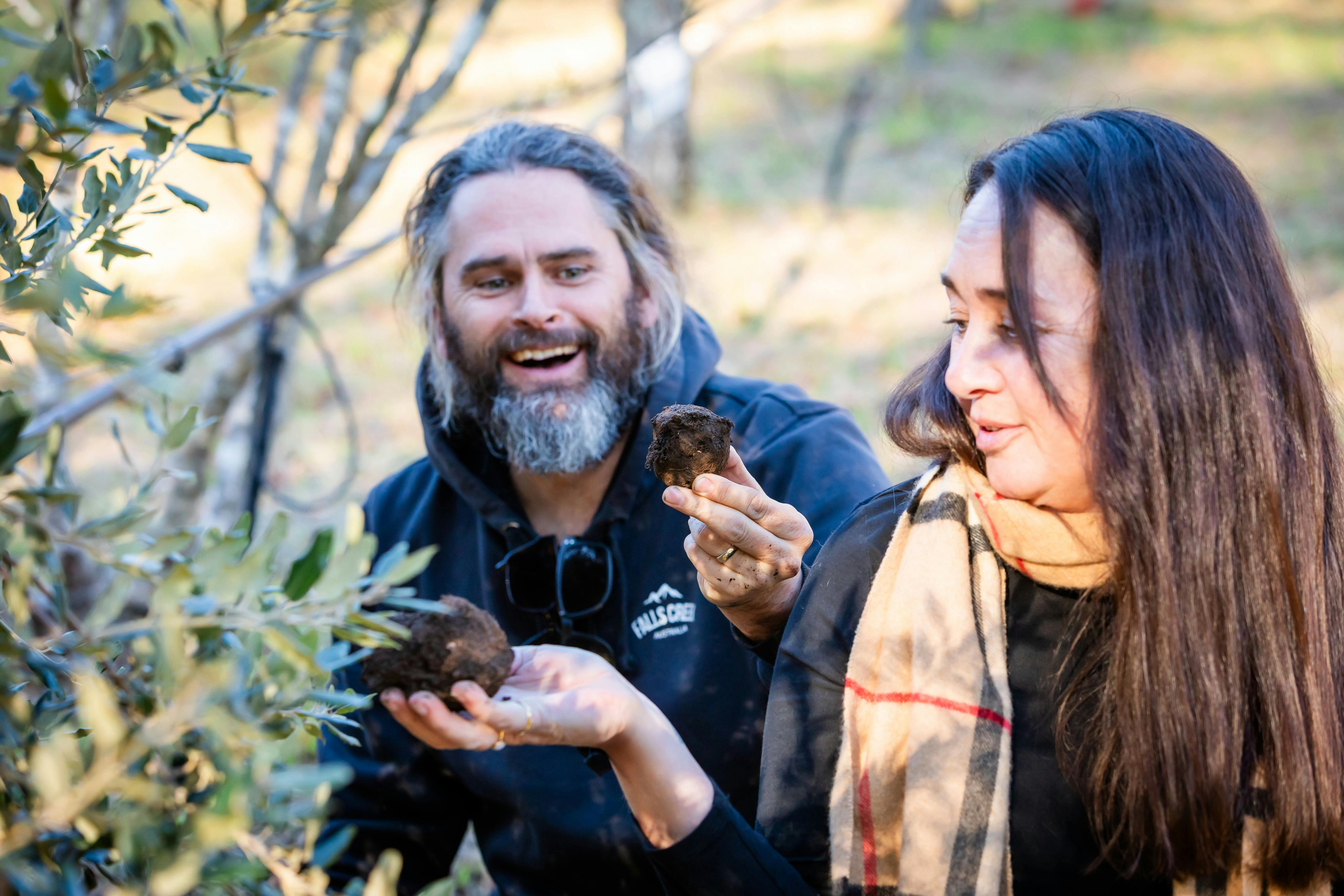 A couple admiring the truffles they found